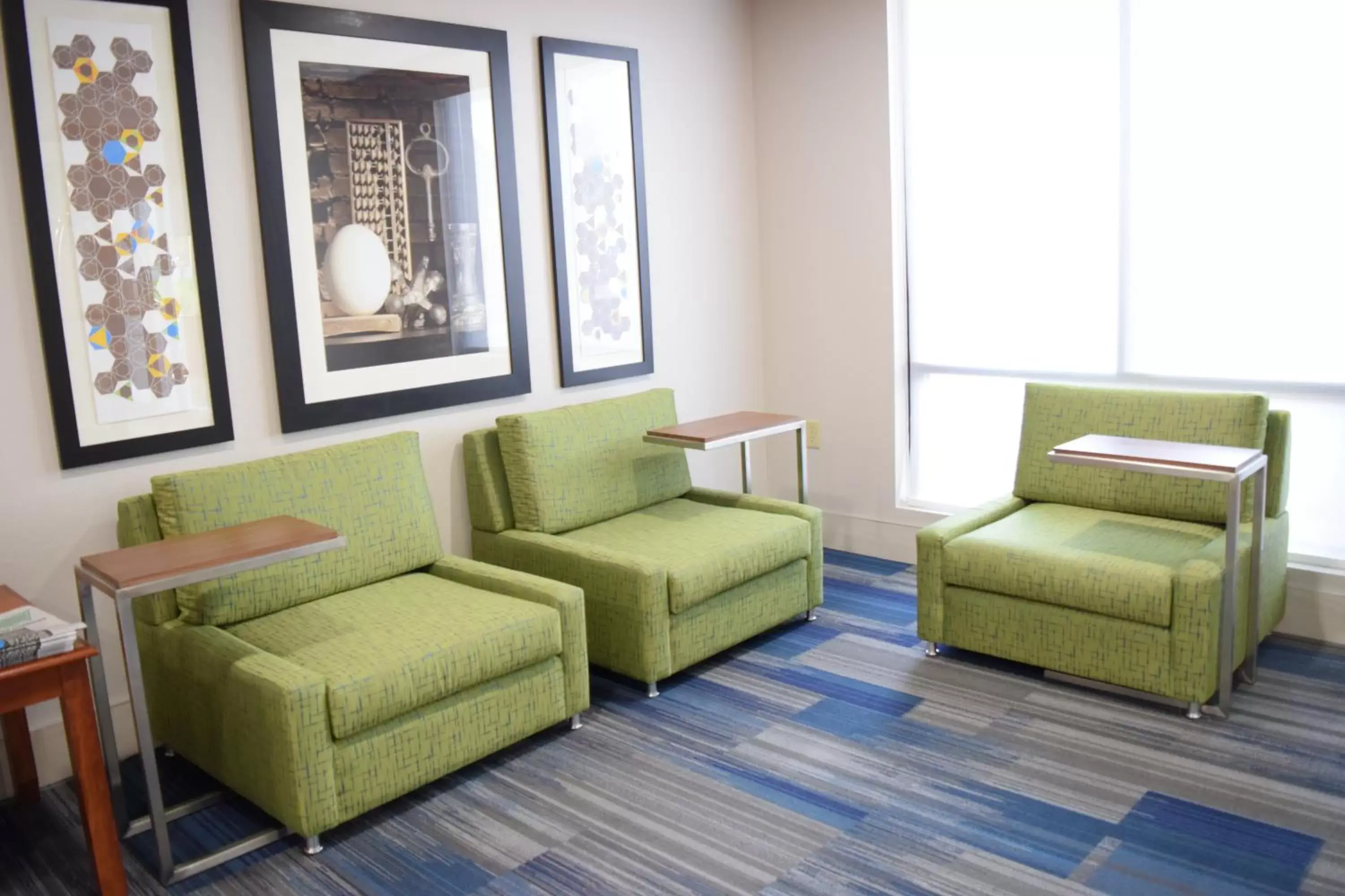 Lobby or reception, Seating Area in Holiday Inn Express & Suites Pensacola West I-10, an IHG Hotel