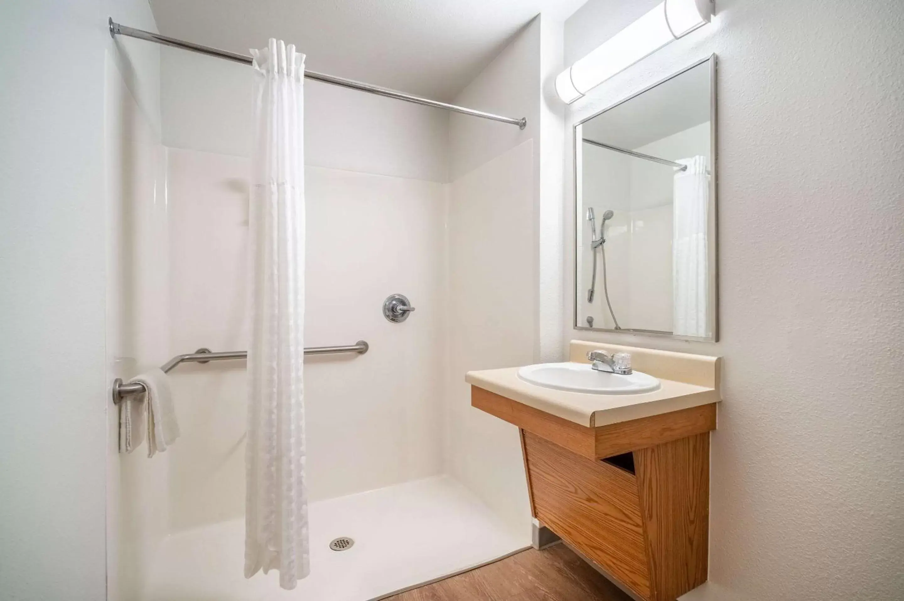 Bathroom in WoodSpring Suites Corpus Christi