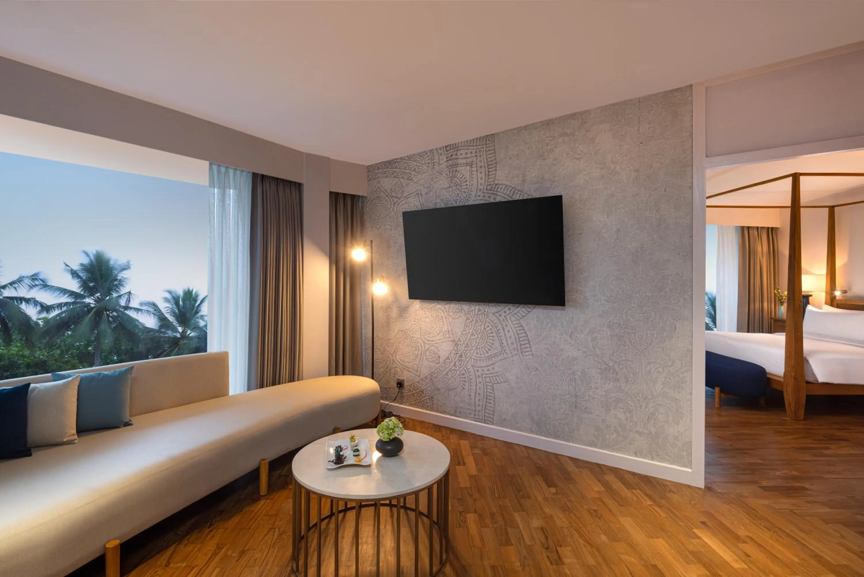 Living room, Bed in Occidental Eden Beruwala