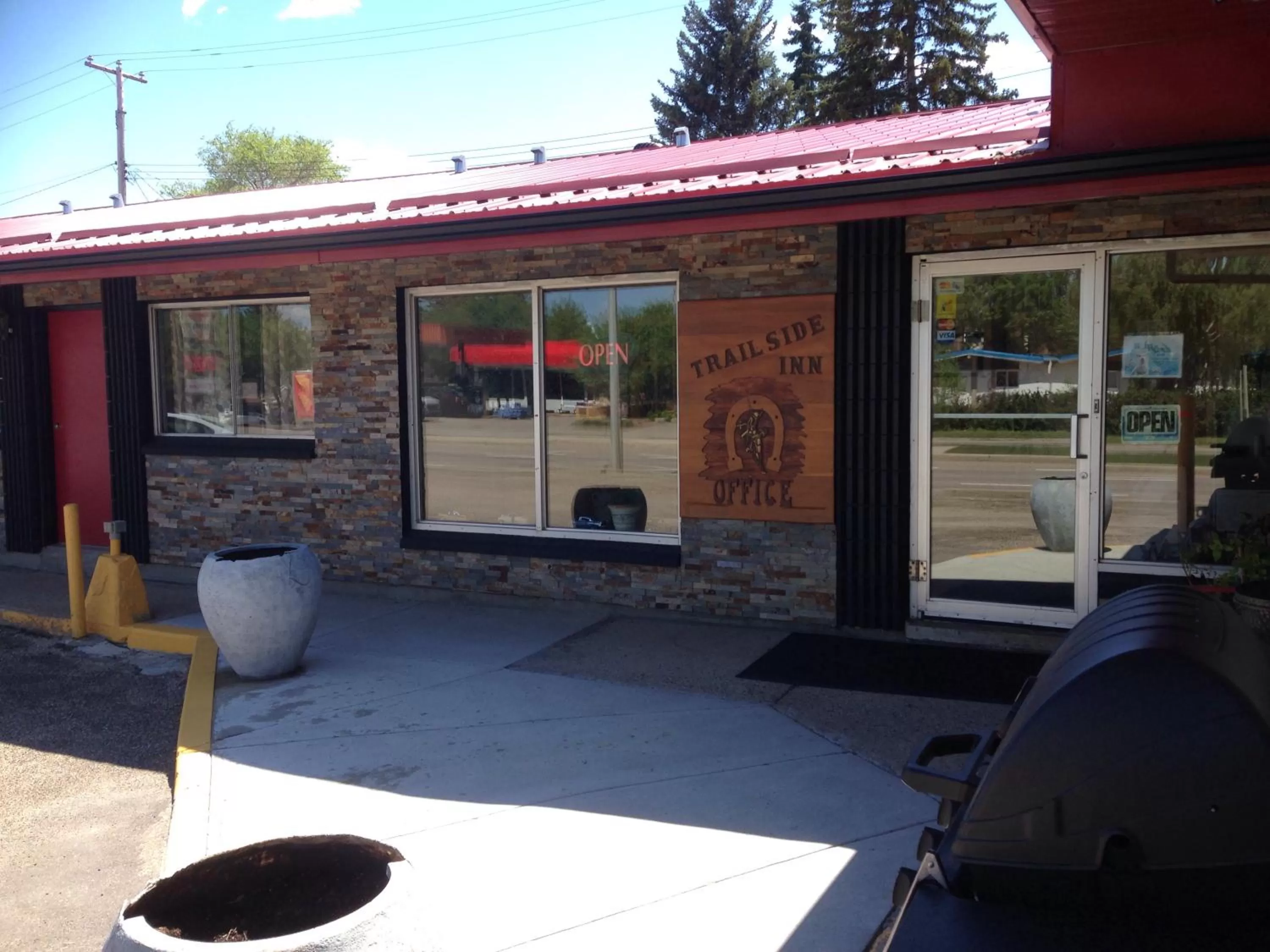 Property logo or sign in Trailside Inn