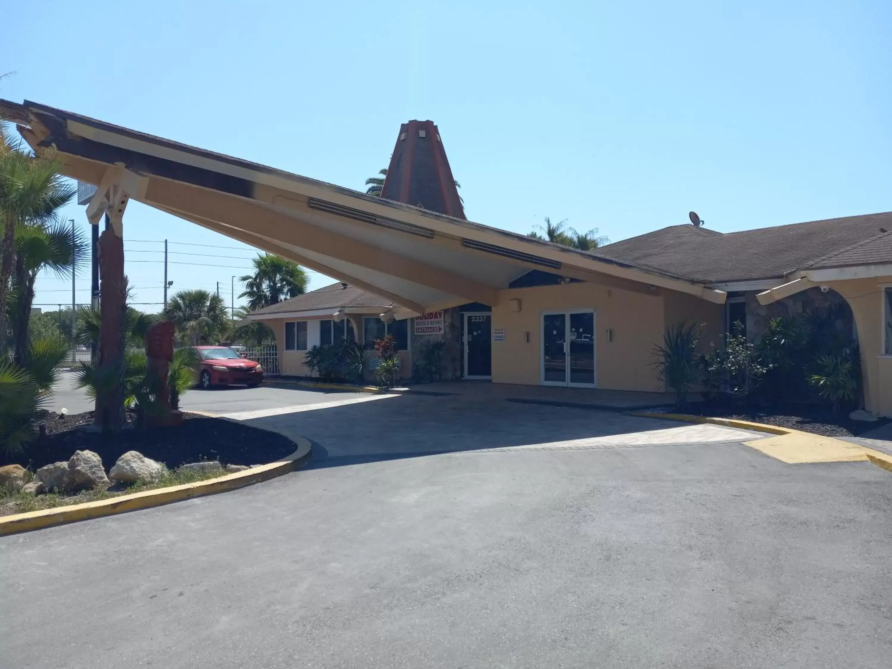 Lobby or reception, Property Building in Holiday Hotel