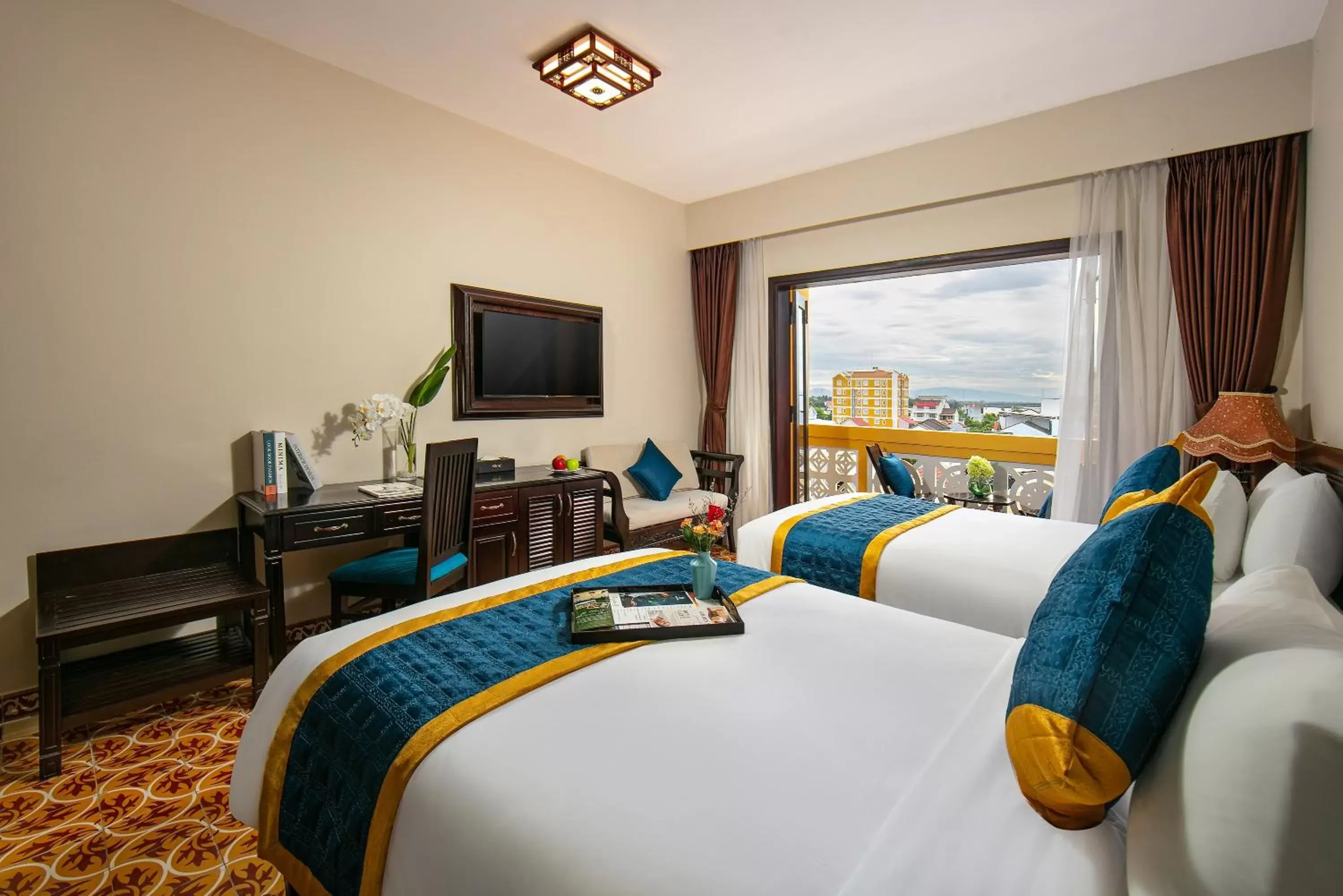 Bed in La Charm Hoi An Hotel & Spa Bed in La Charm Hoi An Hotel & Spa