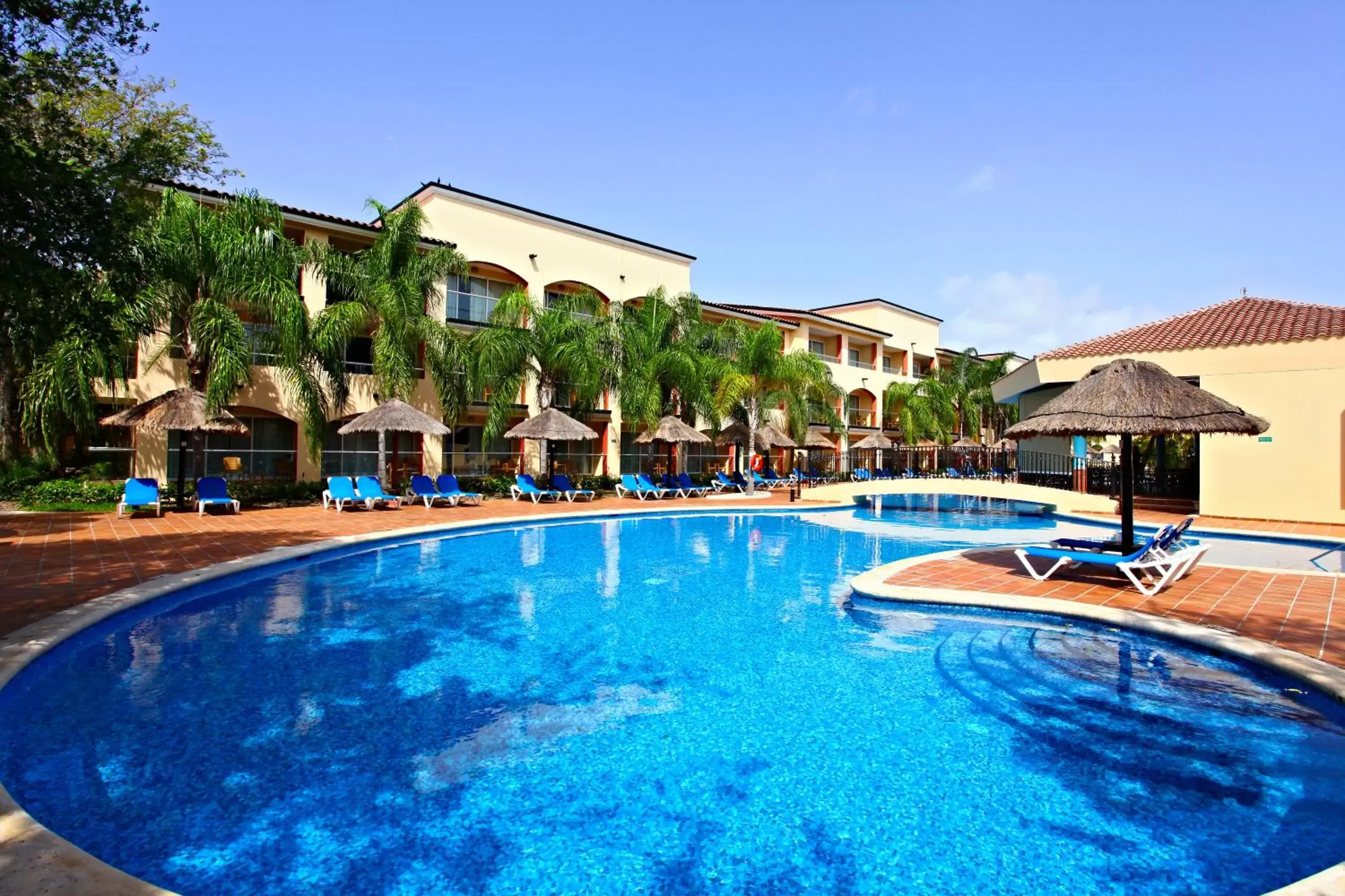 Swimming pool, Property Building in Sandos Playacar All Inclusive
