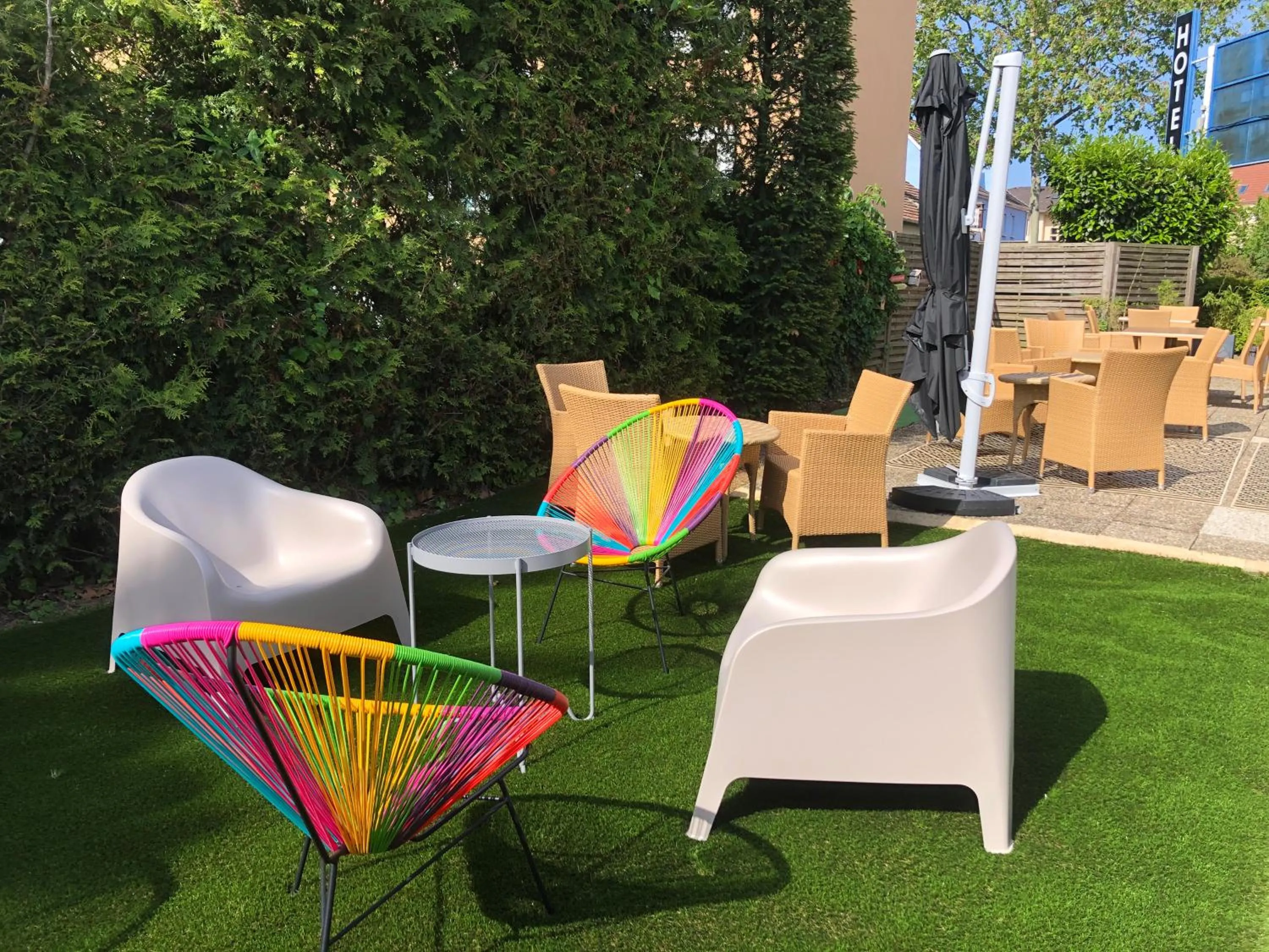 Patio in Hotel Arc-En-Ciel Colmar Contact Hotel