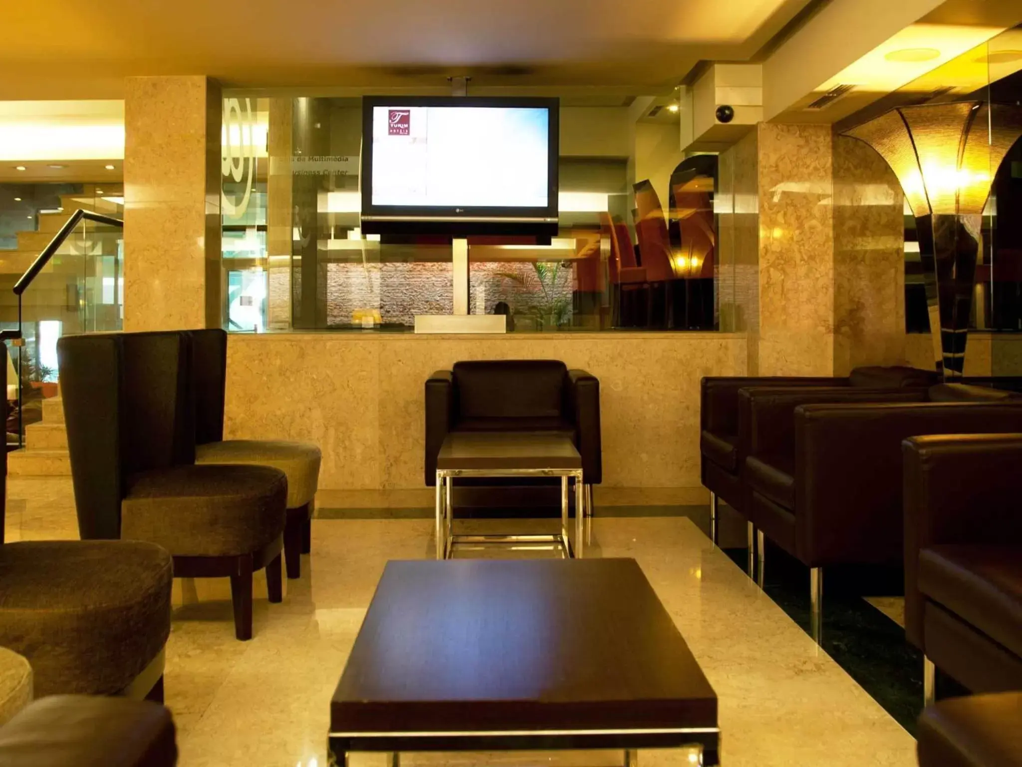 Communal lounge/ TV room in TURIM Iberia Hotel