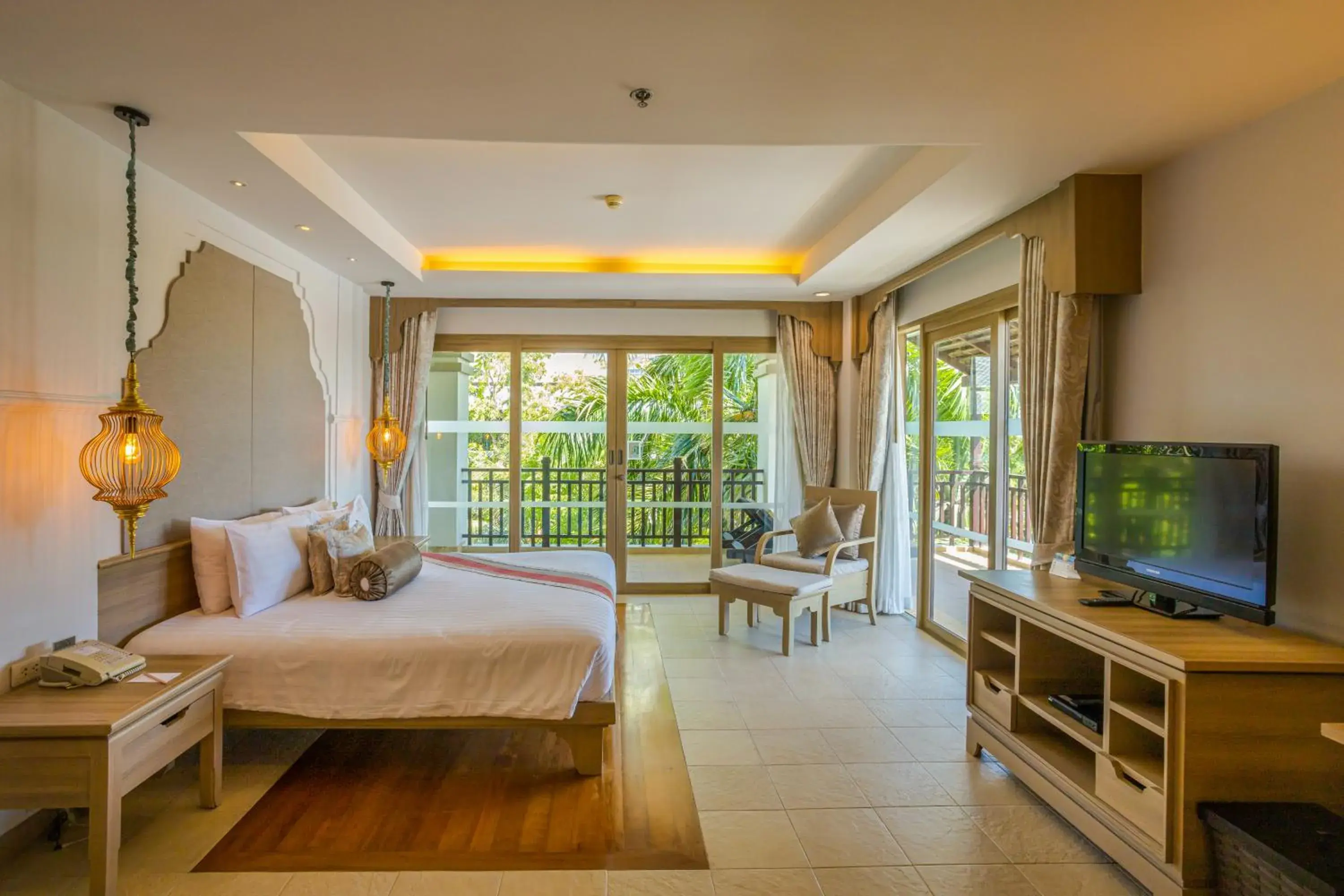 Bedroom, TV/Entertainment Center in Ravindra Beach Resort & Spa - SHA Extra Plus