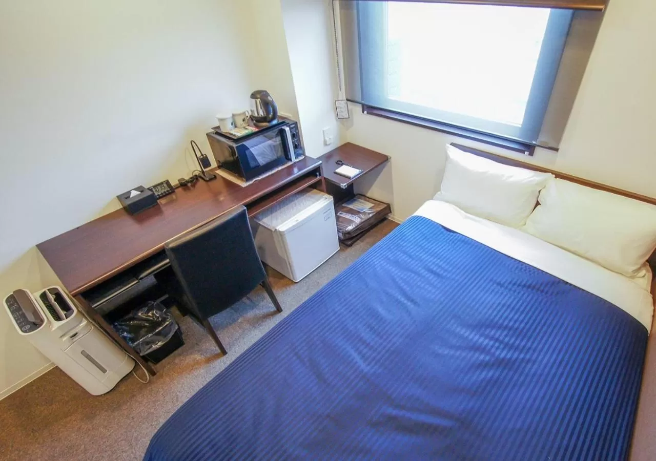 Photo of the whole room, Bed in HOTEL LiVEMAX Kanazawa Ekimae