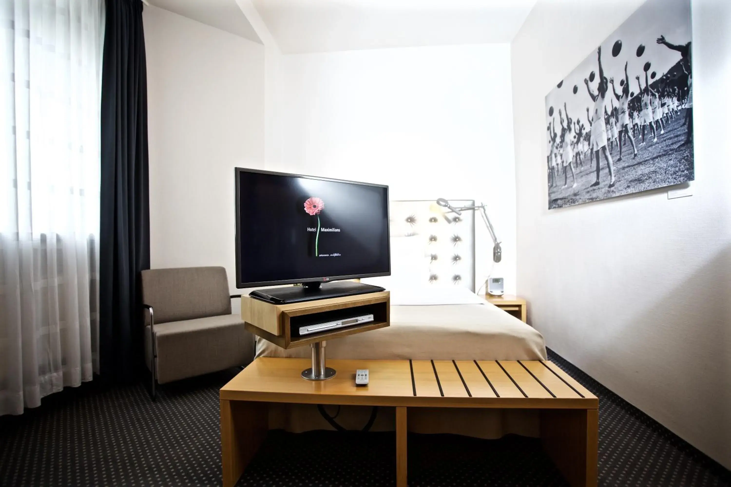 Photo of the whole room, TV/Entertainment Center in Hotel Maximilians