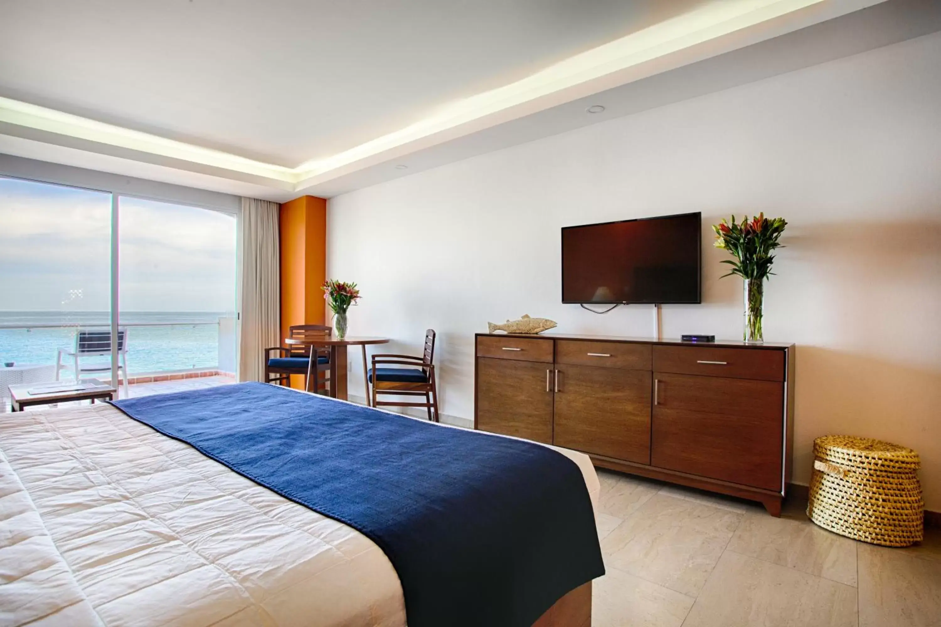 Photo of the whole room, TV/Entertainment Center in The Paramar Beachfront Boutique Hotel With Breakfast Included - Downtown Malecon