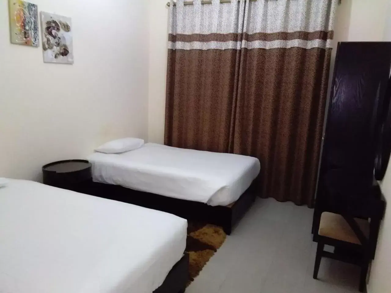 Bed in Al Smou Hotel Apartments - MAHA HOSPITALITY GROUP