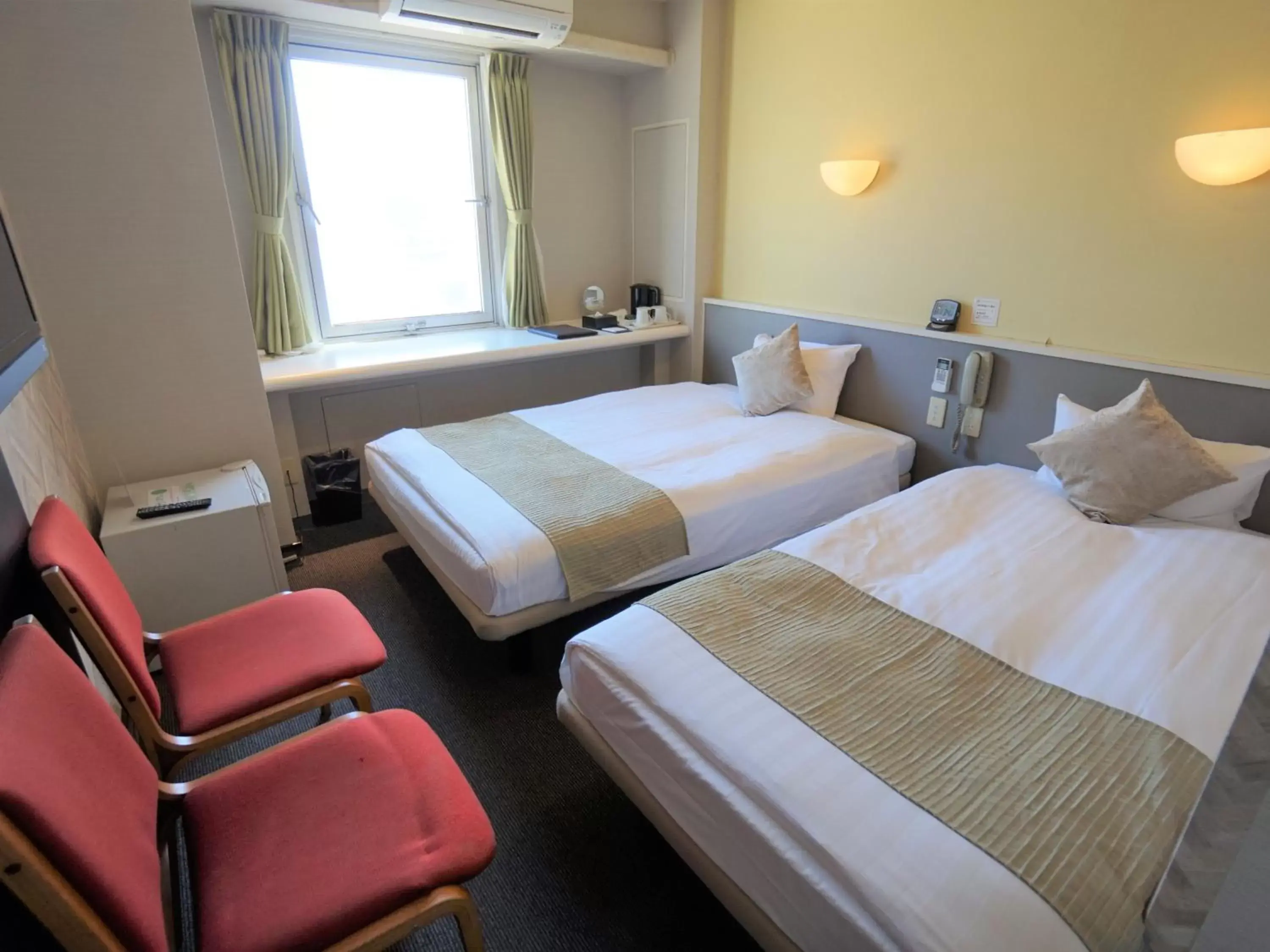 Photo of the whole room, Bed in Hotel AreaOne Okayama