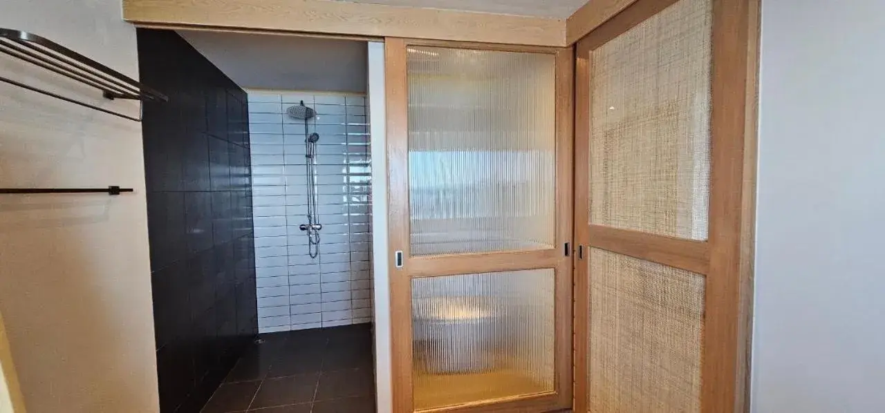 Shower in Punnpreeda Beach Resort - SHA Plus Certified