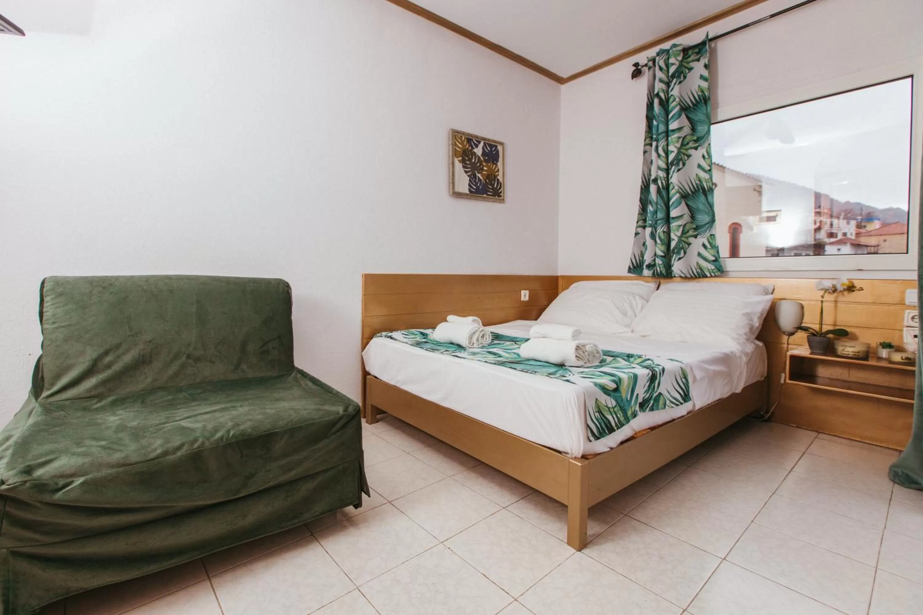 Bedroom in Hotel Christina - Happy Days