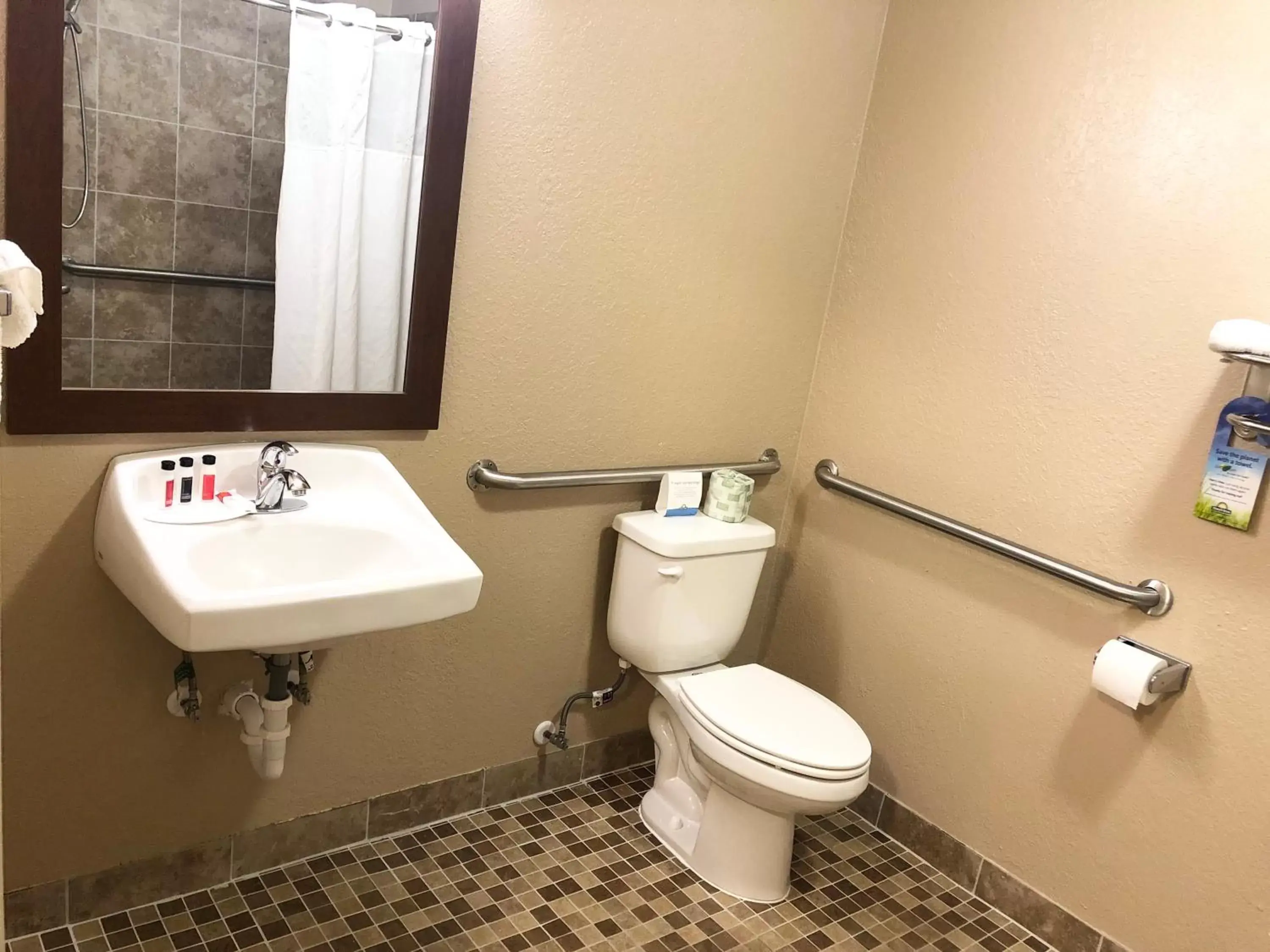 Bathroom in Days Inn by Wyndham West Des Moines