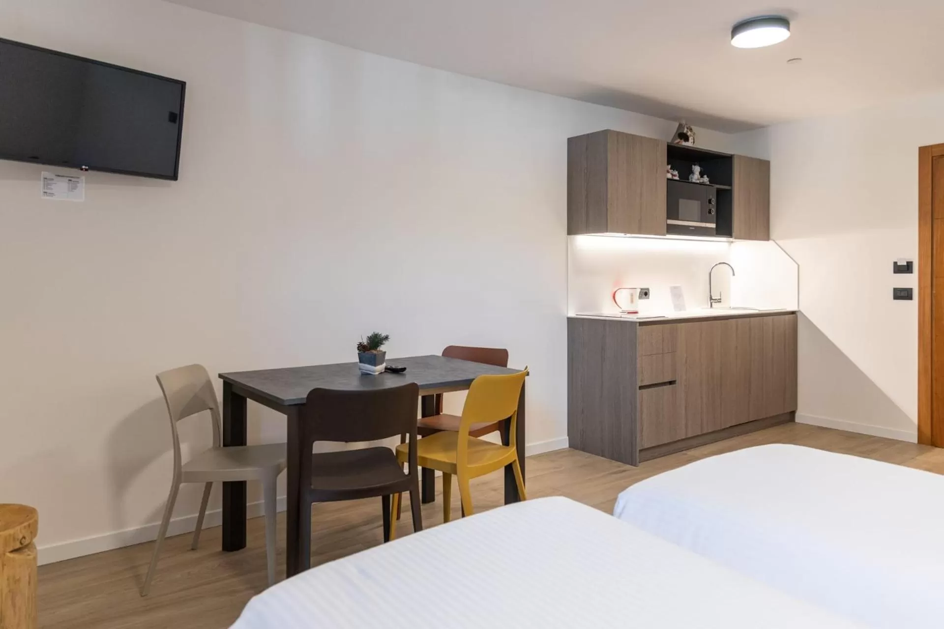 TV and multimedia, Bed in Olimpia Hotel