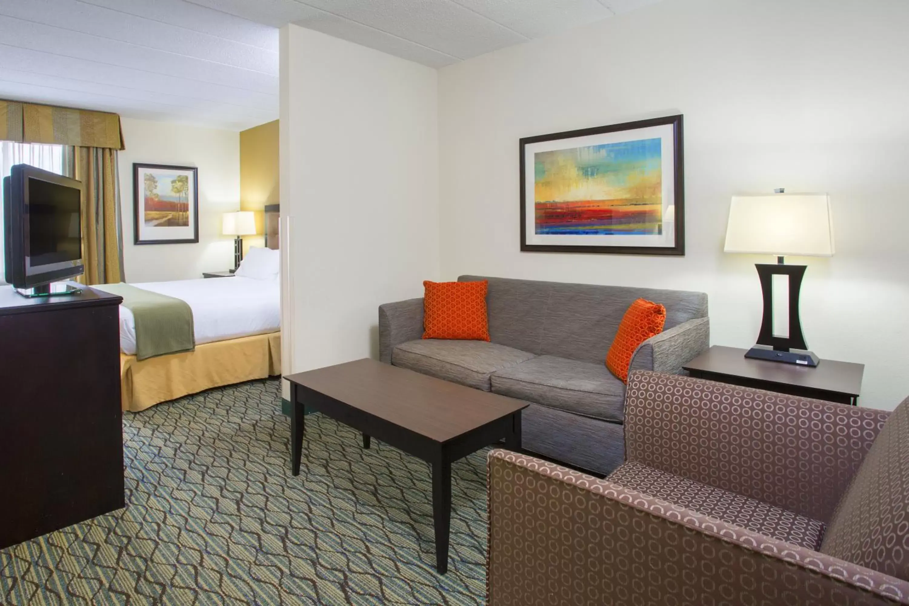 Bedroom, Seating Area in Holiday Inn Express Hotel & Suites Columbus Airport, an IHG Hotel