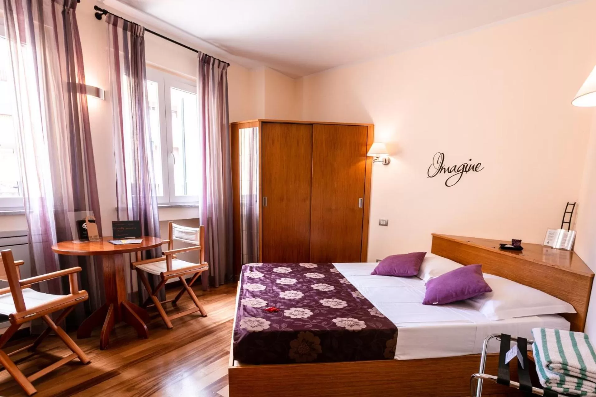 Photo of the whole room, Bed in Oasi Hotel