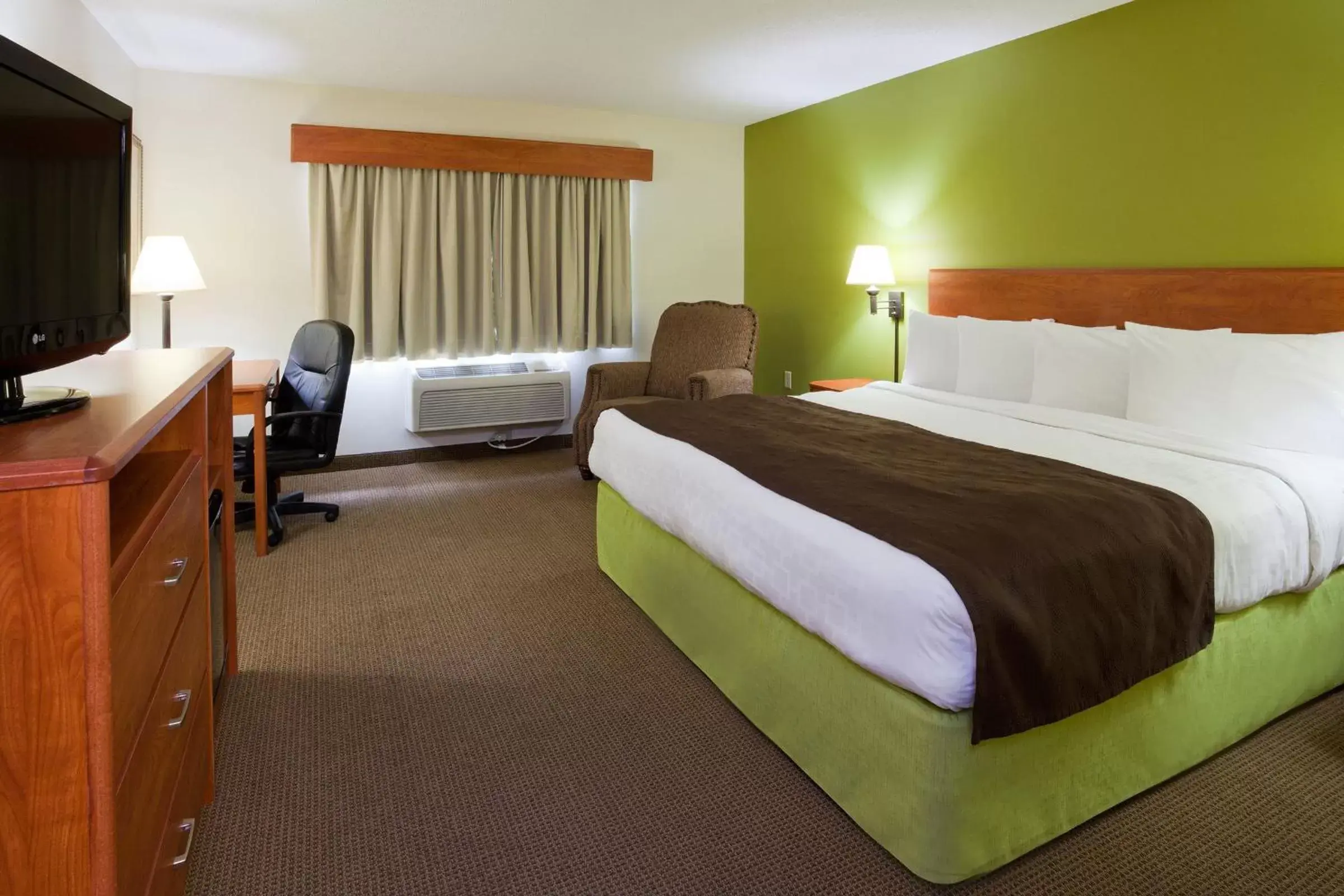 Bed in AmericInn by Wyndham Thief River Falls