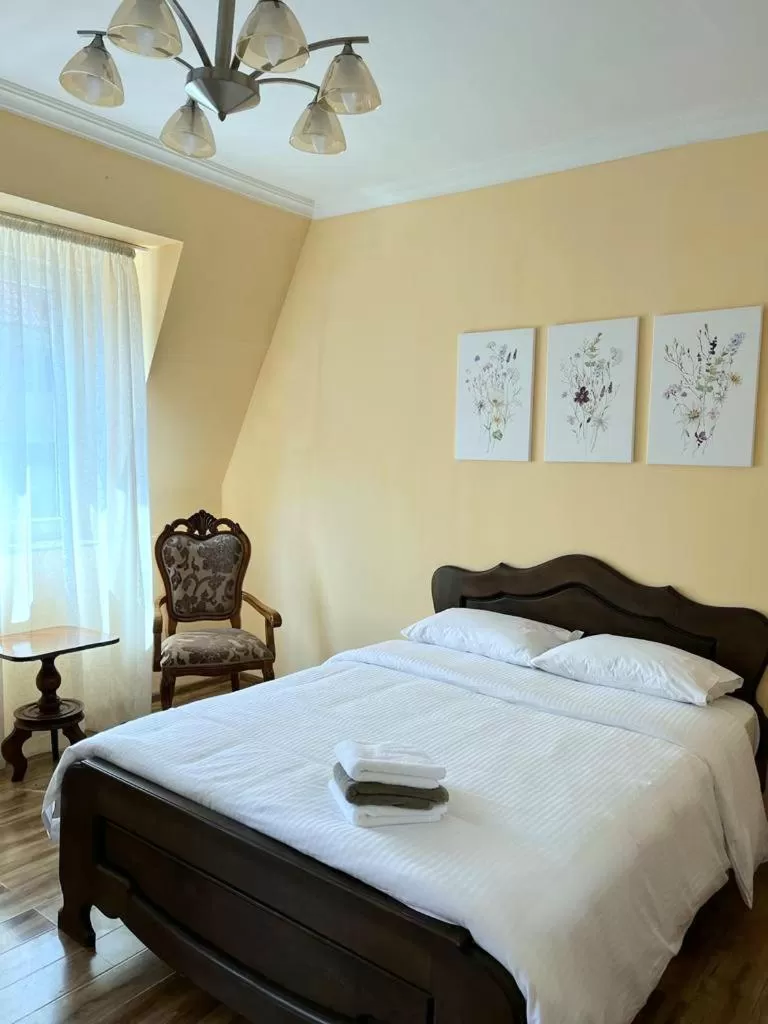 Photo of the whole room, Bed in OLD ClTY HOTEL BATUMI