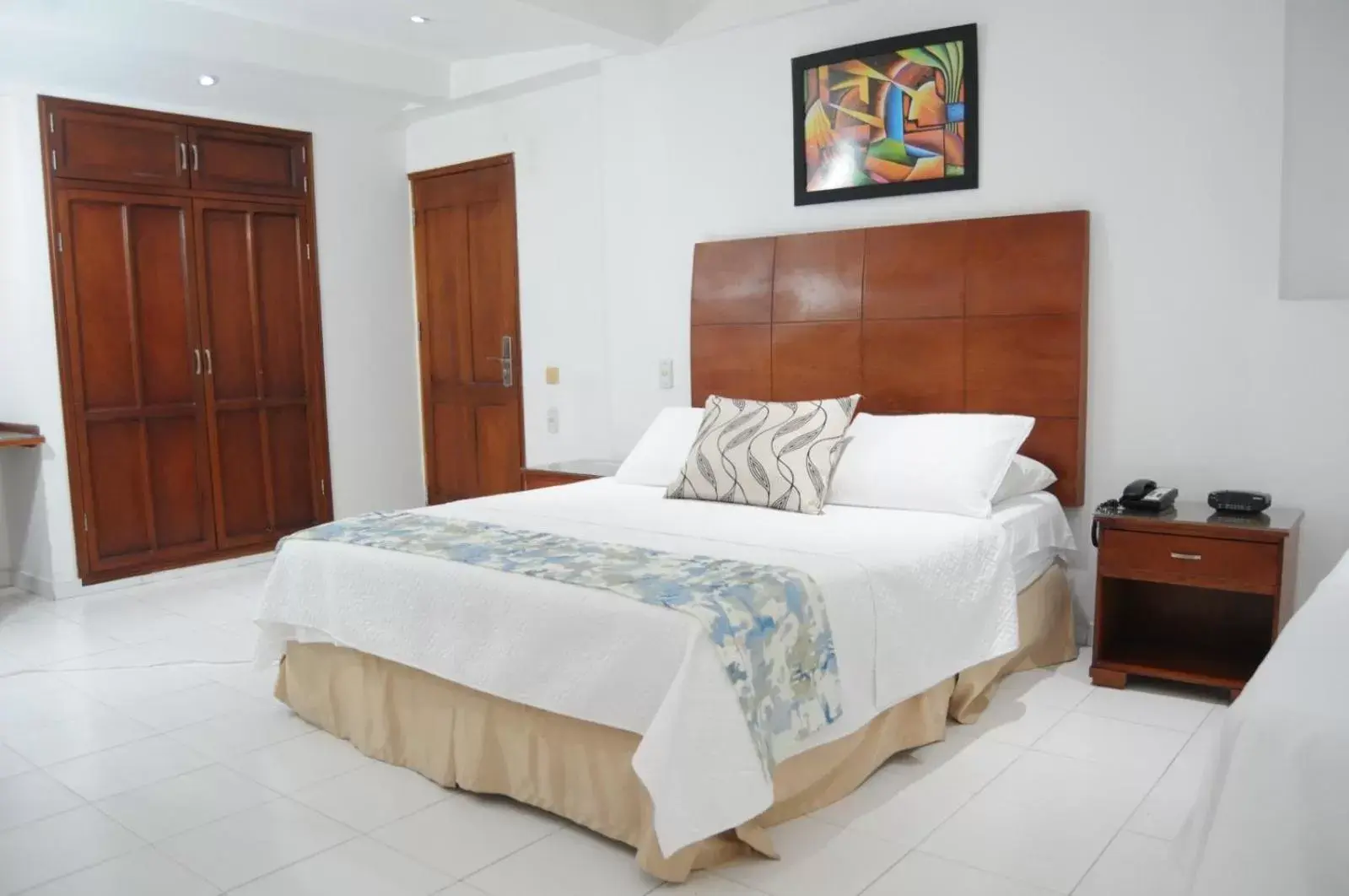 Guests, Bed in Coral Reef Hotel