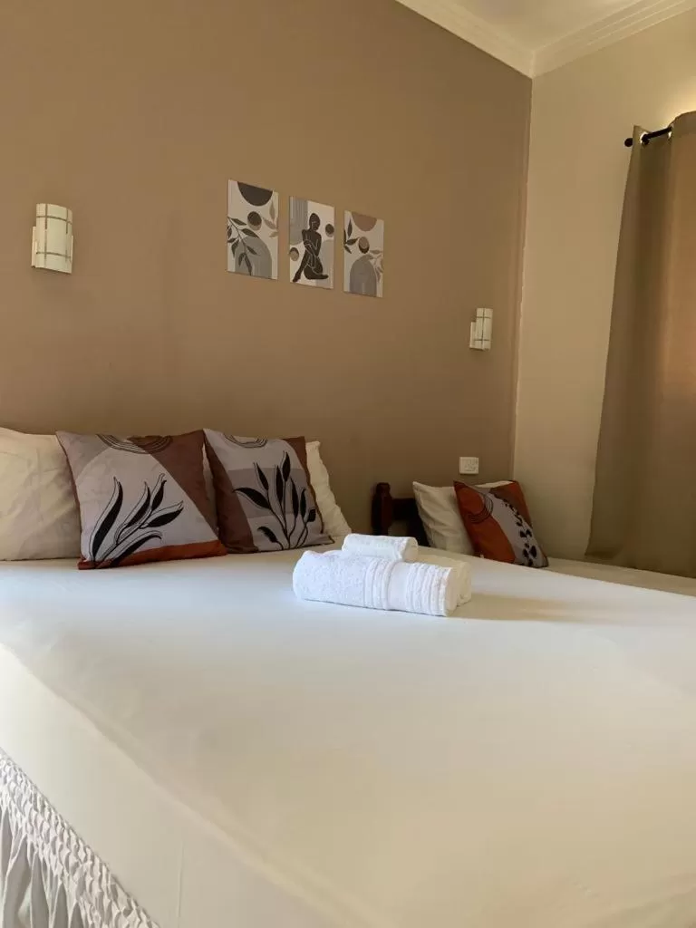 Bed in Pousada Recanto Som do Mar