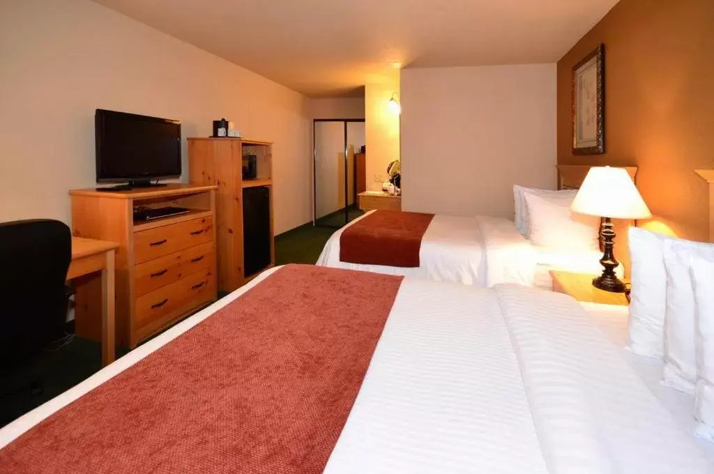 Bed in BEST WESTERN PLUS Hartford Lodge