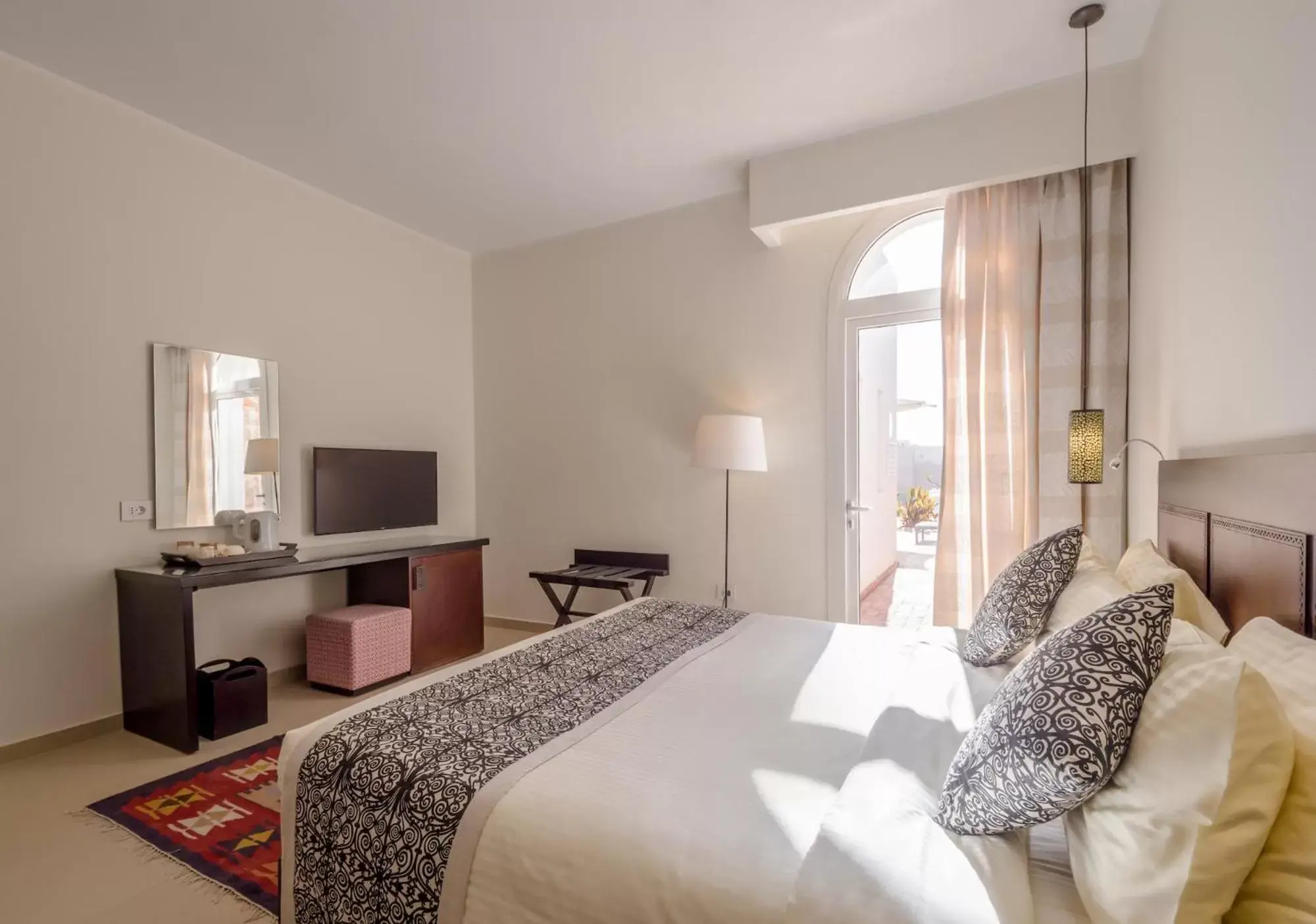 Bed in Fort Arabesque Resort, Spa & Villas