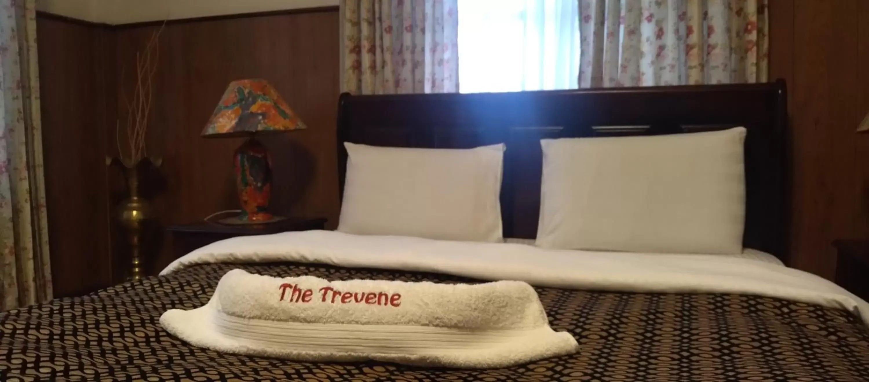 TV and multimedia, Bed in The Trevene Hotel