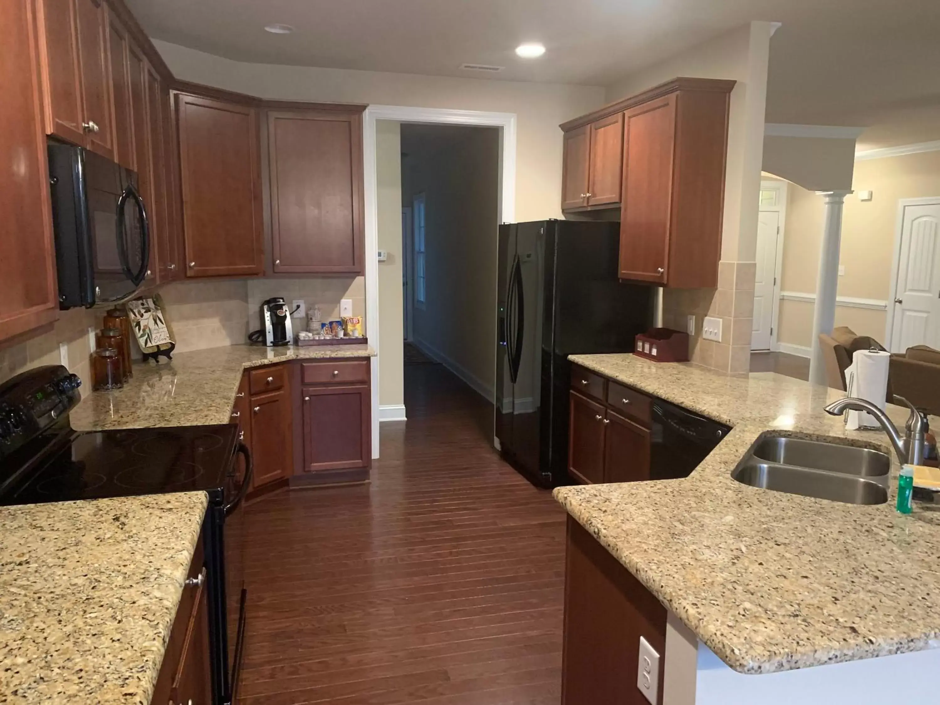 Kitchen/Kitchenette in Cottages and Suites at River Landing