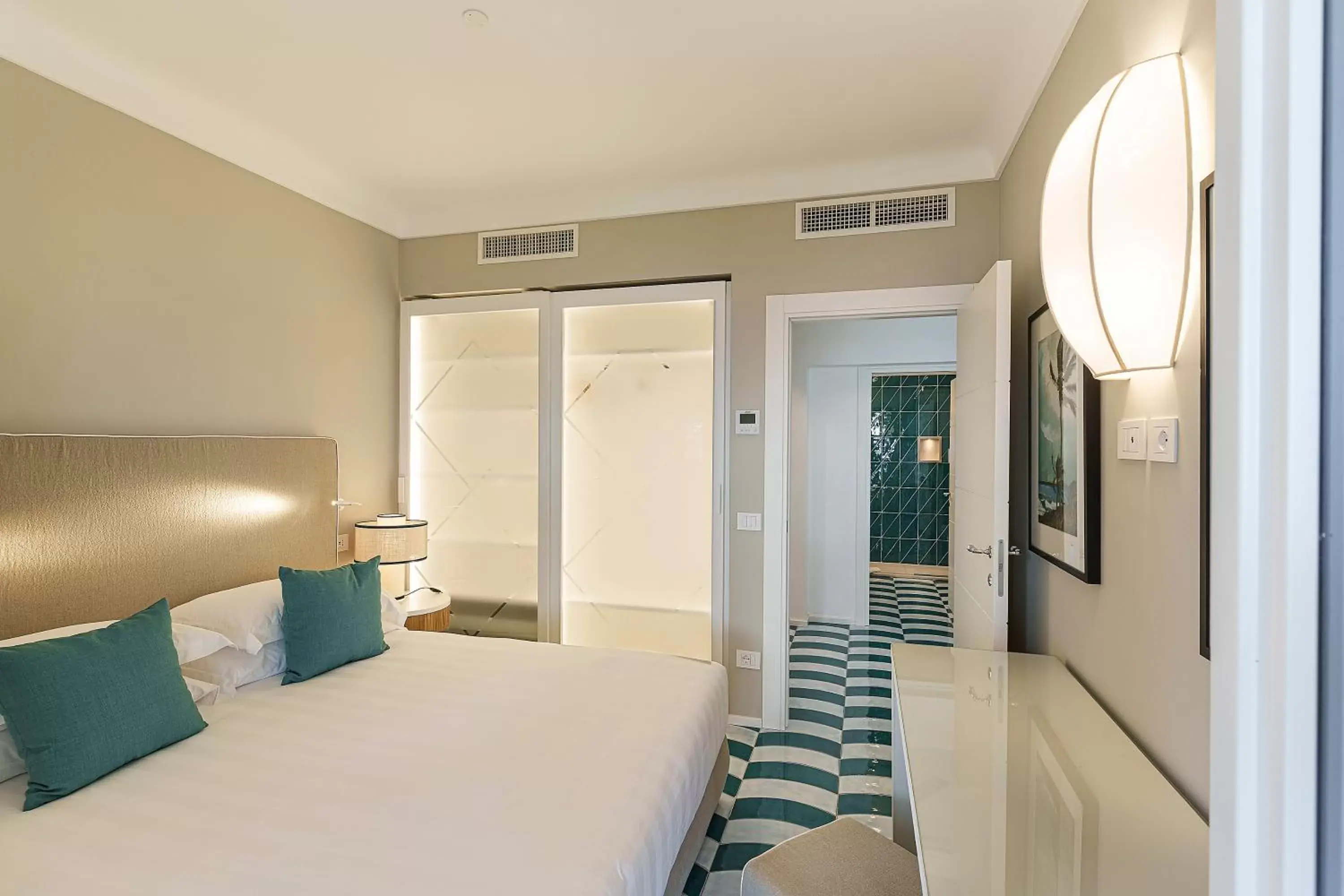 Bed in Costa Del Capitano Seaview Suites & Villas