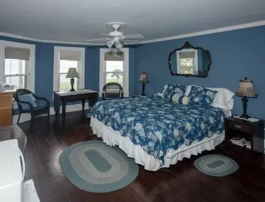 Bedroom in The Peaceful Pelican LLC