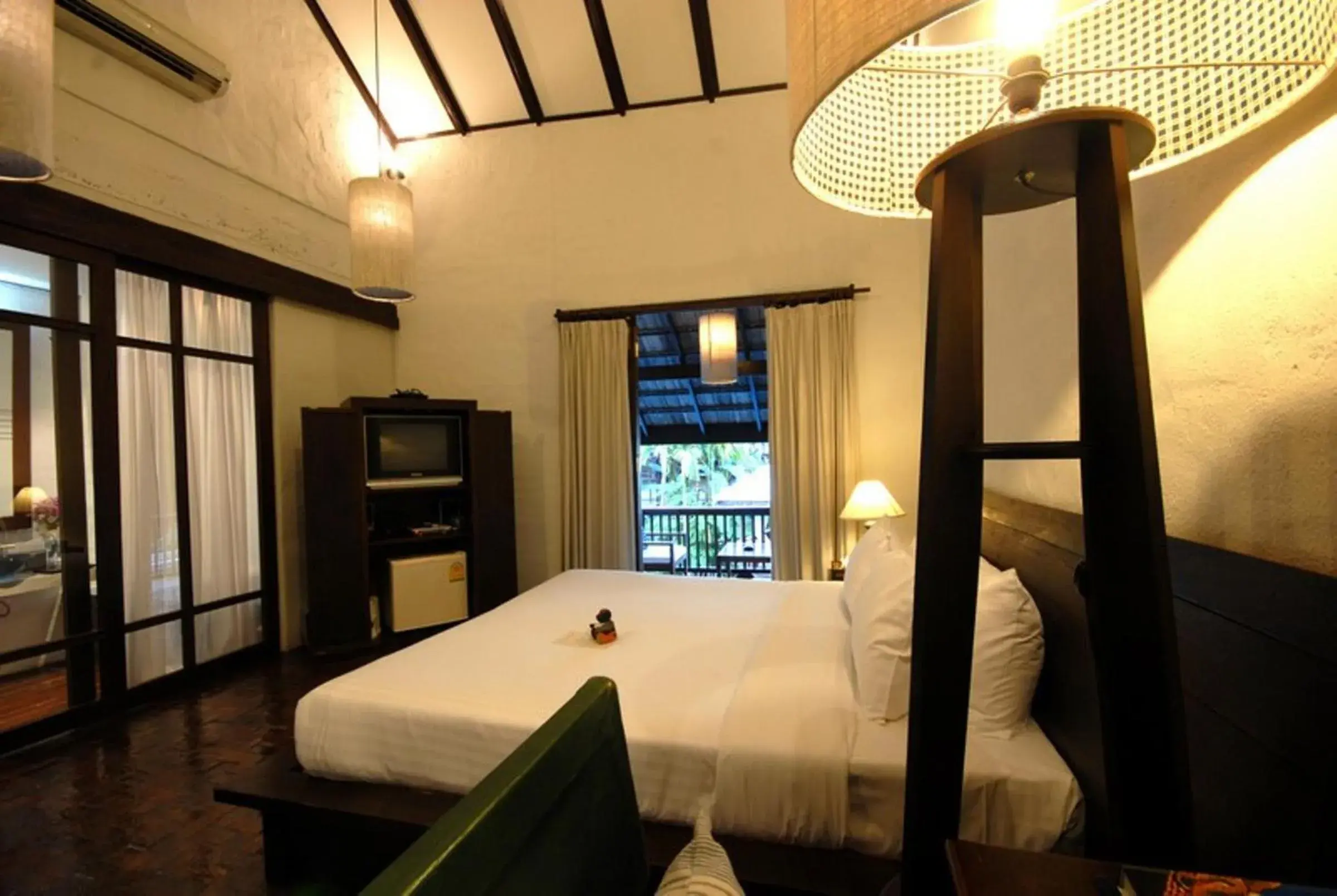 Bed in Banthai Village Hotel