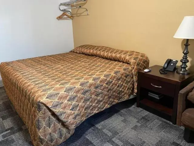 Bed in Americas Best Value Inn