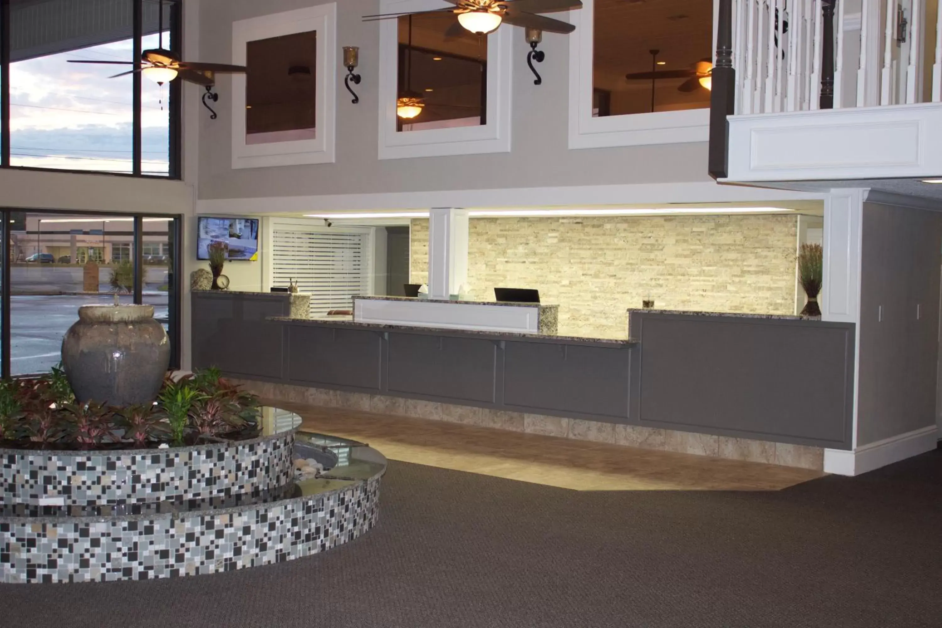 Facade/entrance, Lobby/Reception in At Home Inn & Suites