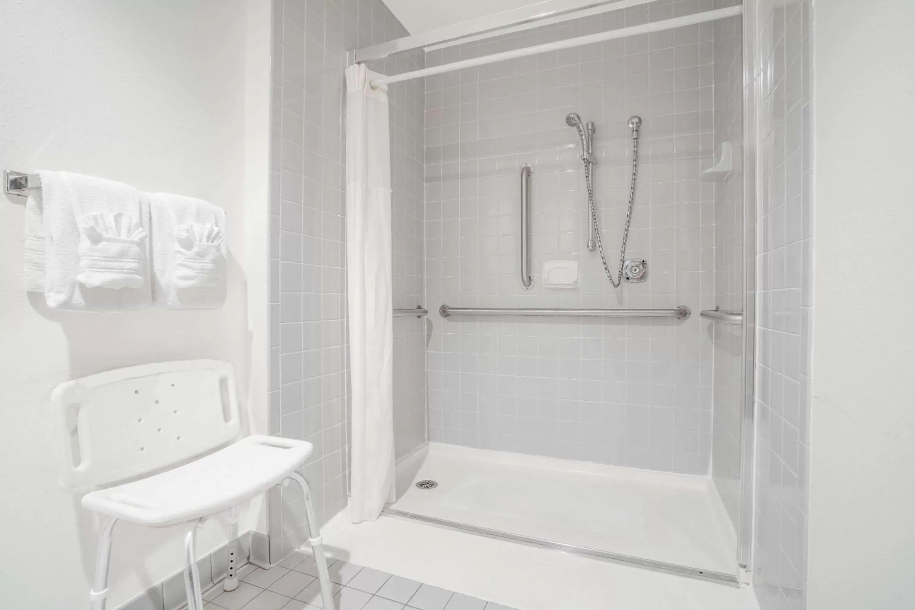 Shower, Bathroom in Super 8 by Wyndham Tomah Wisconsin