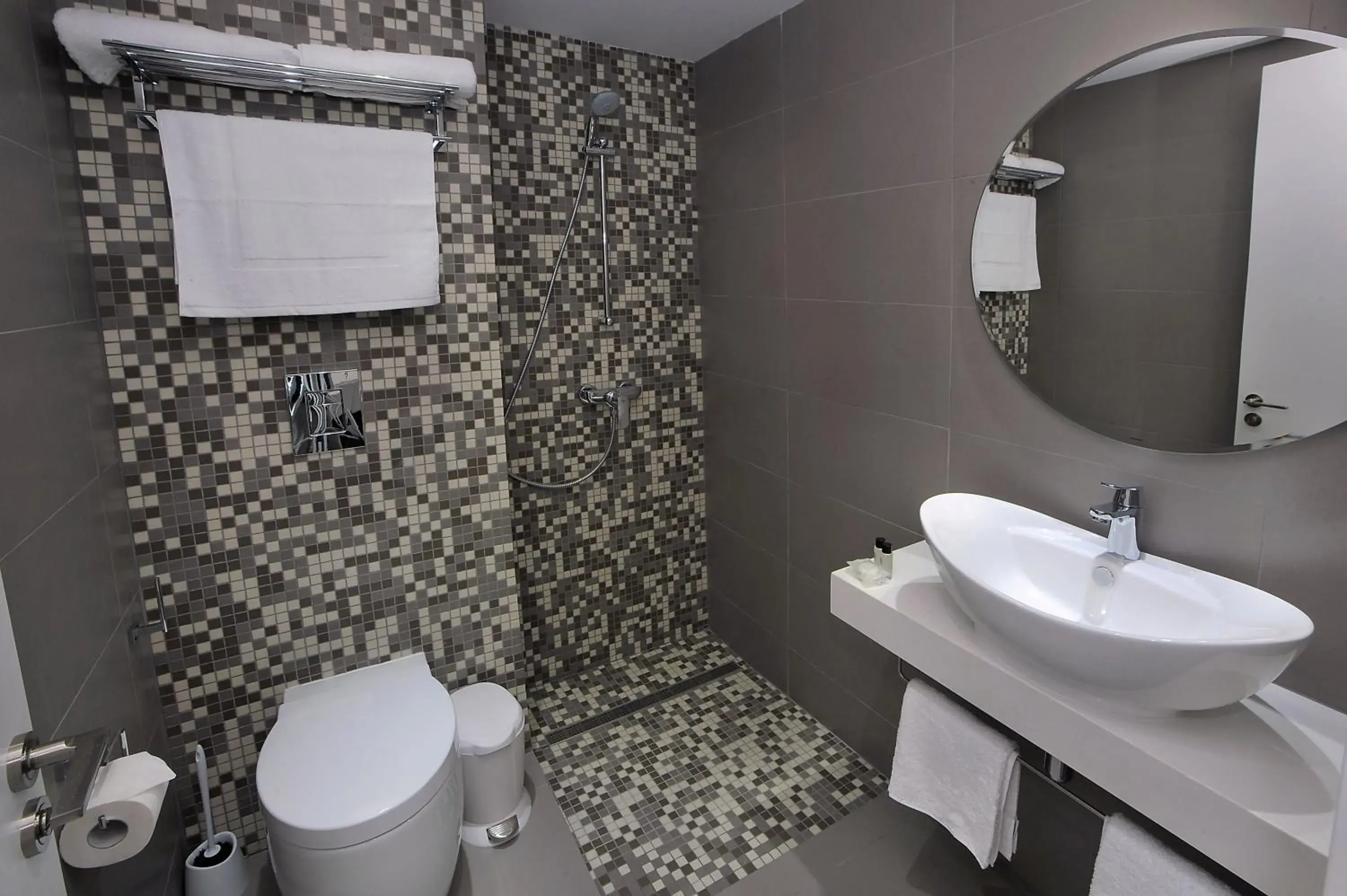 Bathroom in Okeanos Beach Boutique Hotel