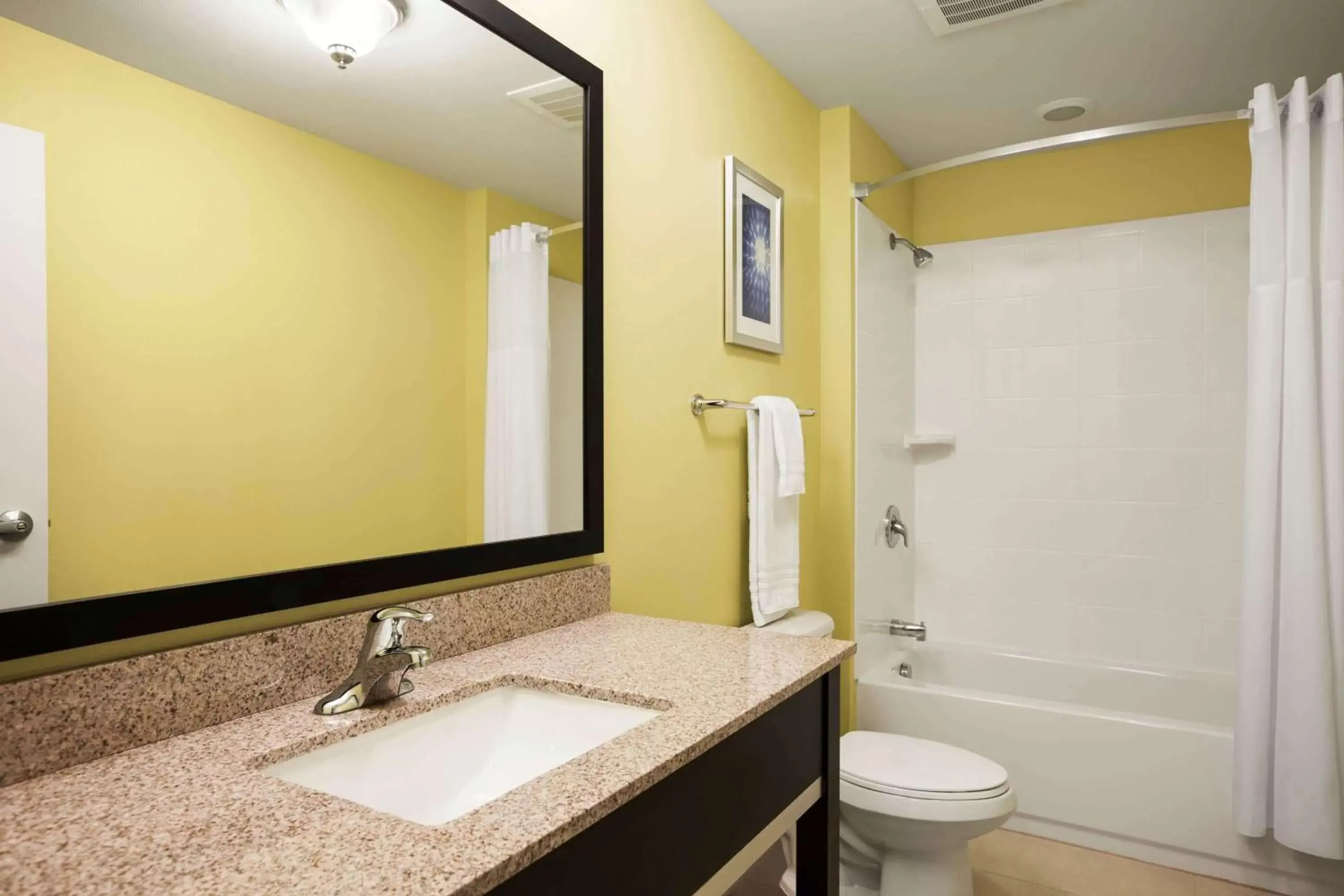 Bathroom in Days Inn & Suites by Wyndham Altoona