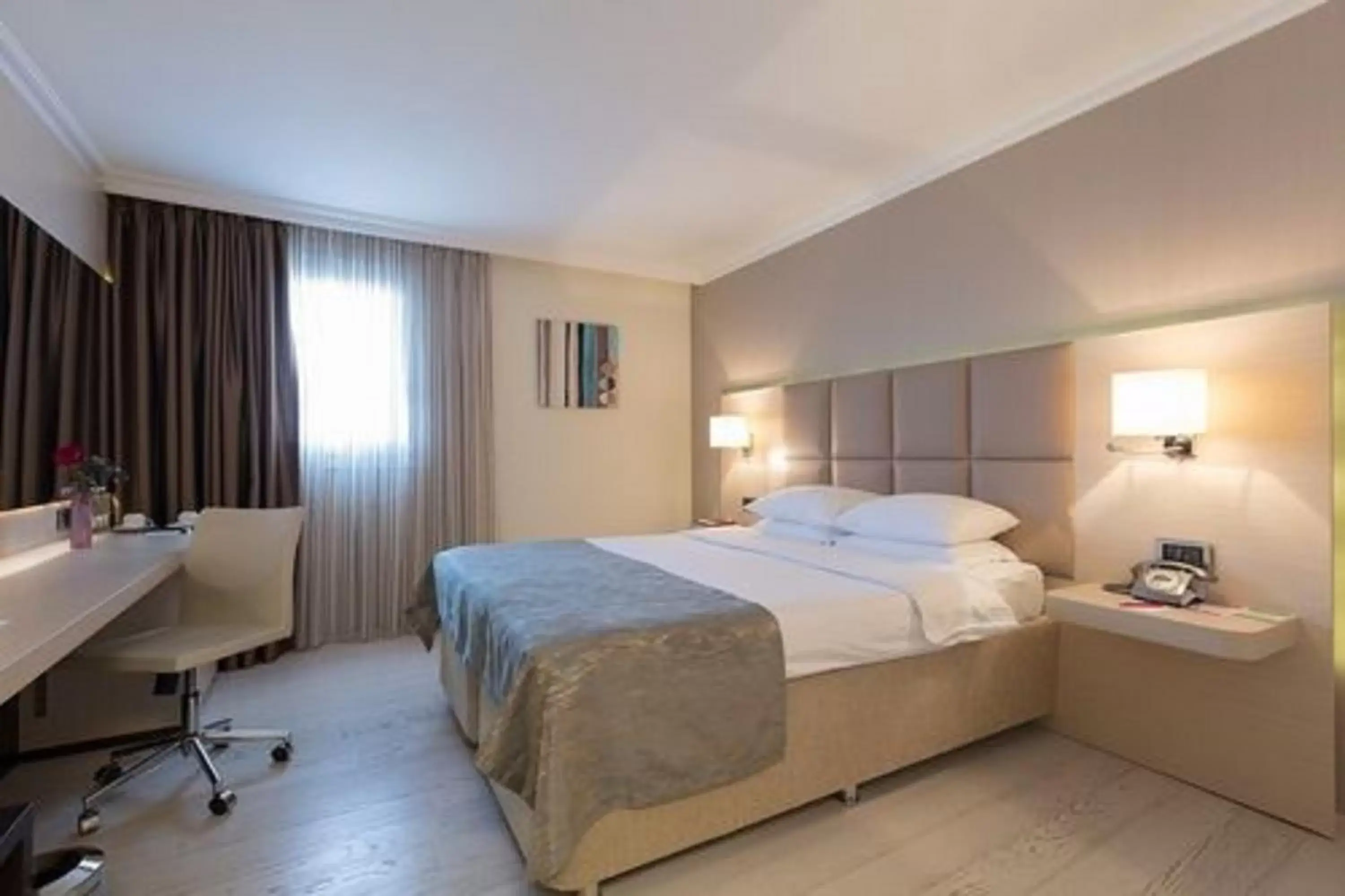 Photo of the whole room, Bed in Ramada by Wyndham Sofia City Center