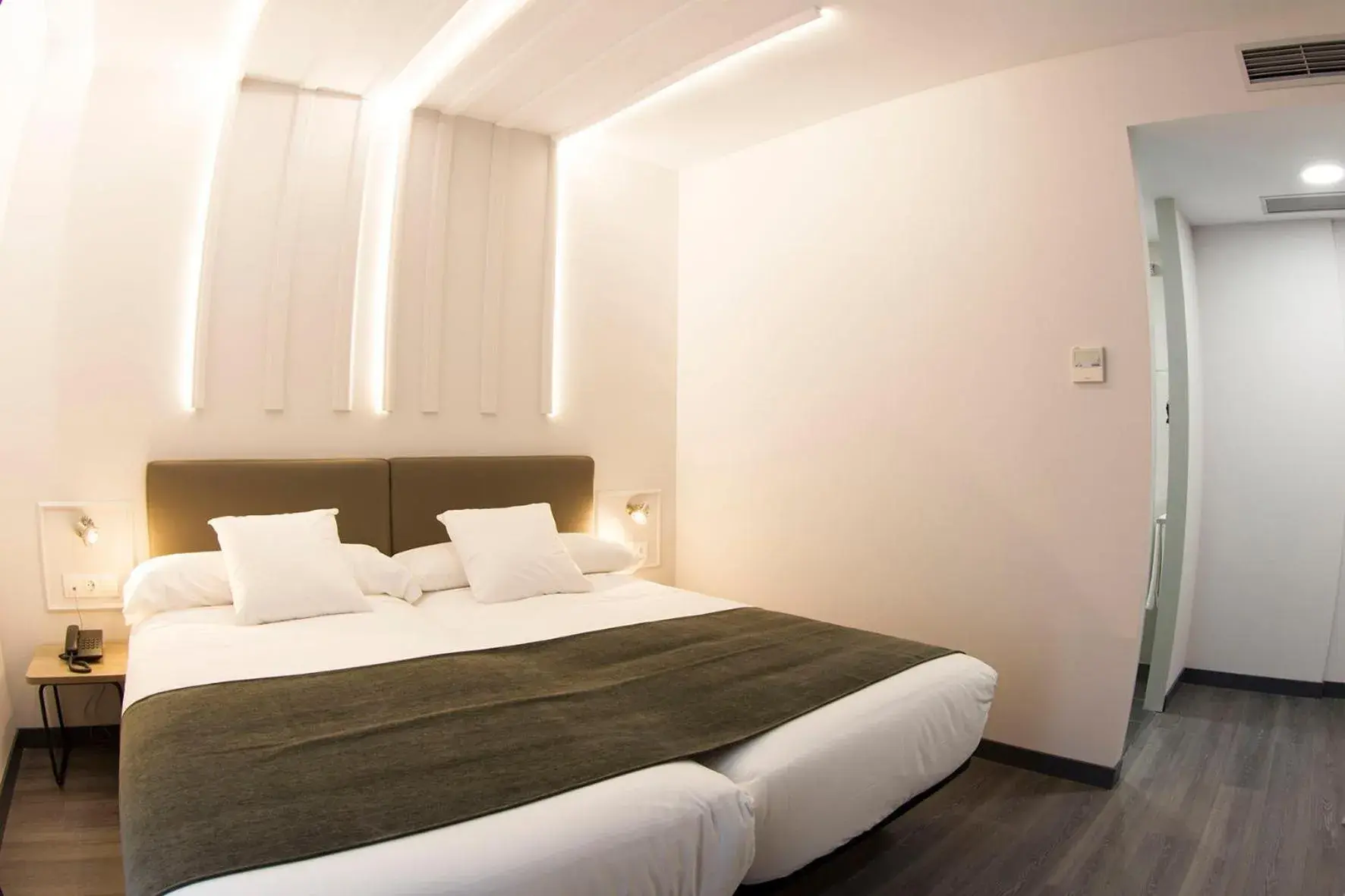 Bed in Hotel Lux Santiago Bed in Hotel Lux Santiago