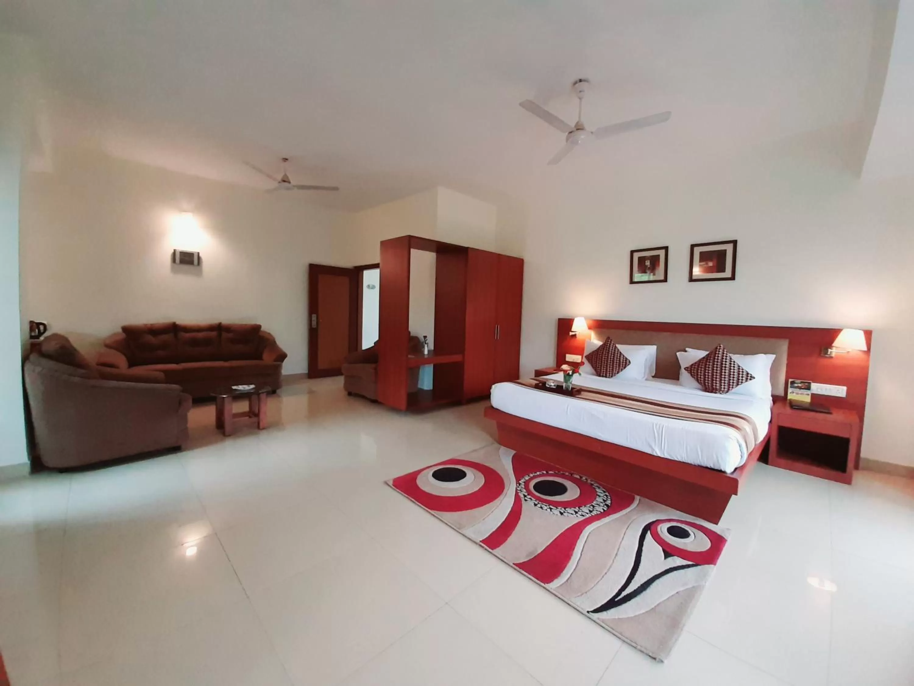 Photo of the whole room, Bed in Hotel Phoenix Koregaon Park