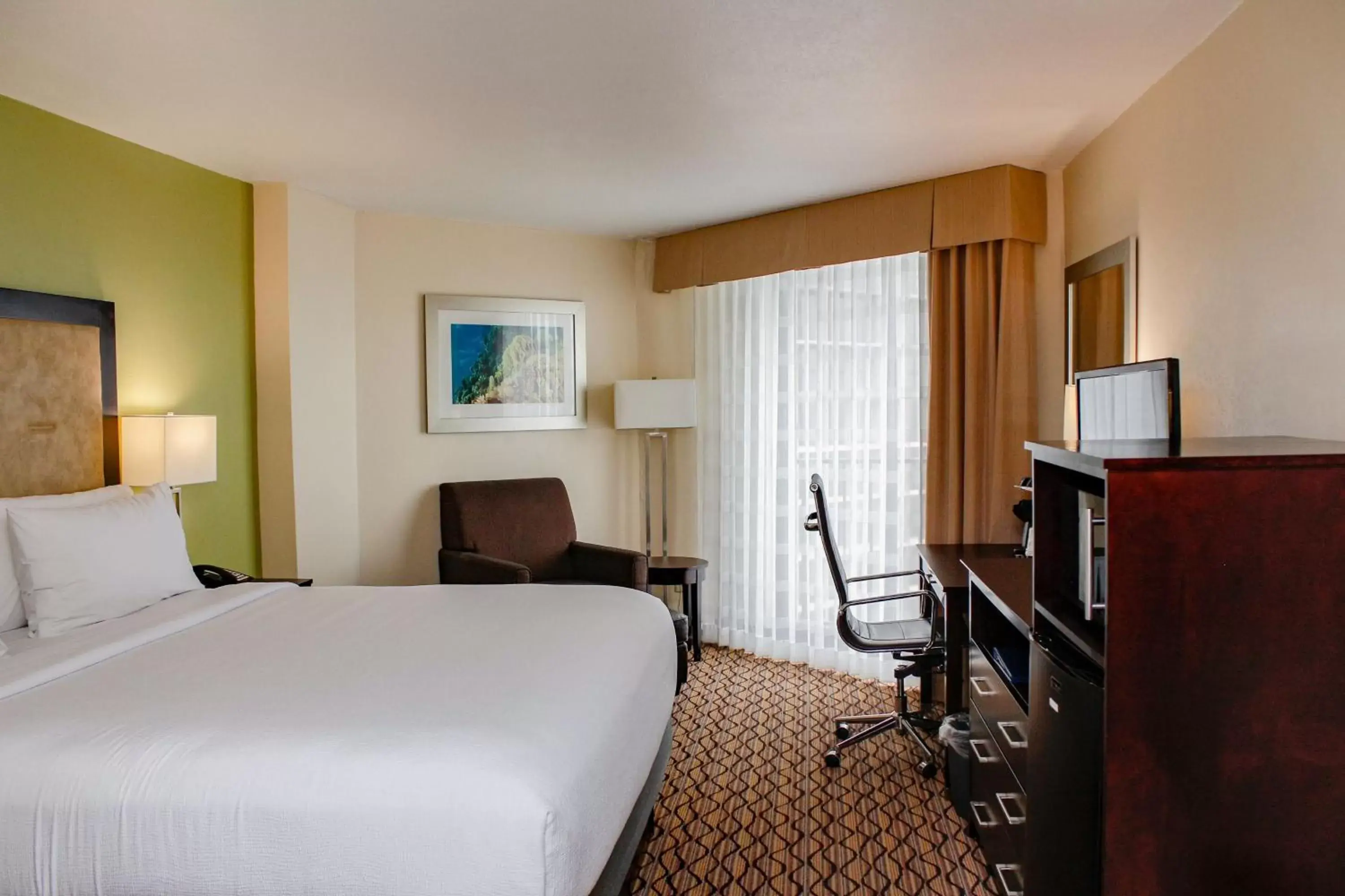 Photo of the whole room, TV/Entertainment Center in Holiday Inn Corpus Christi Downtown Marina, an IHG Hotel