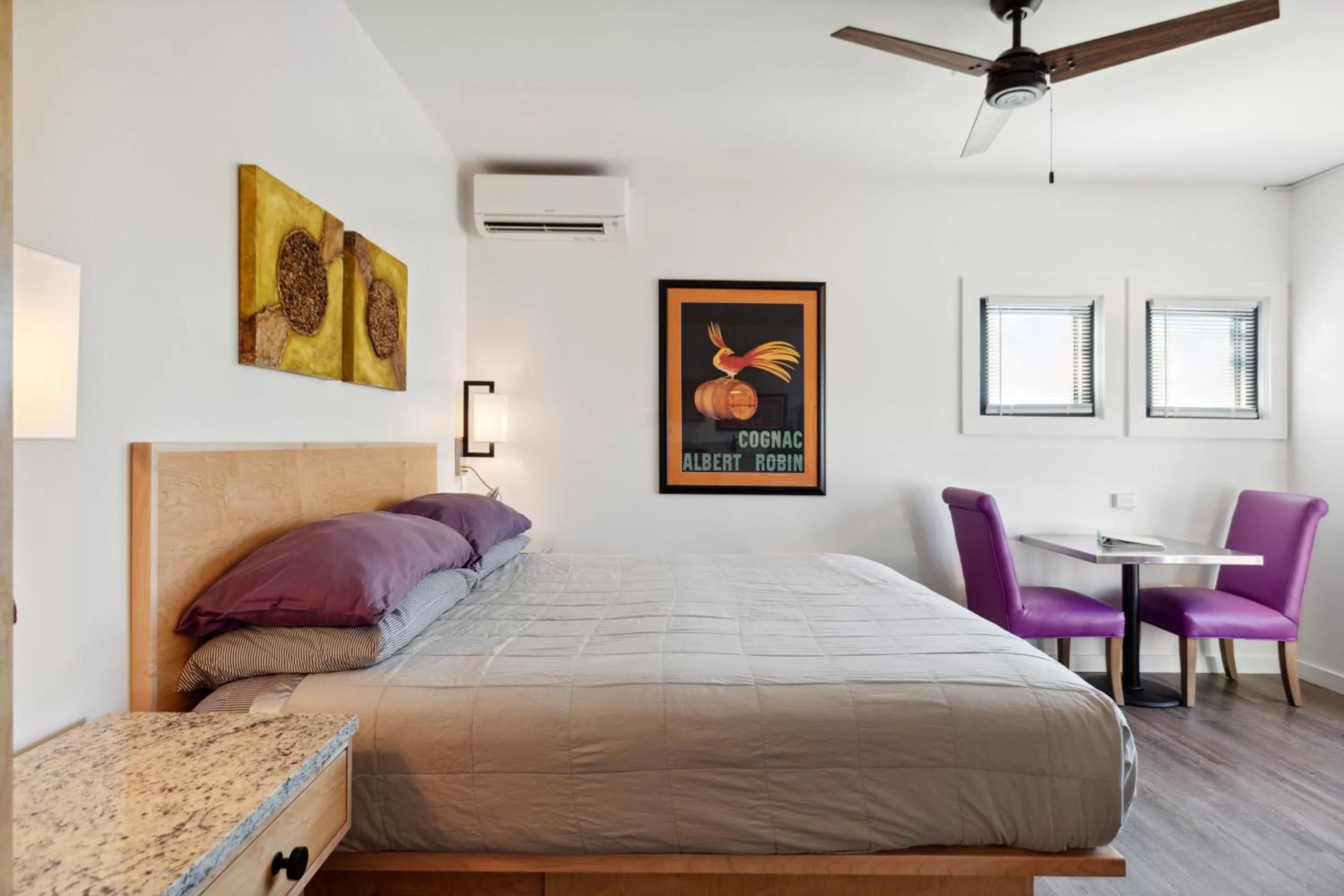 Bed in Hotel Folly with Marsh and Sunset Views