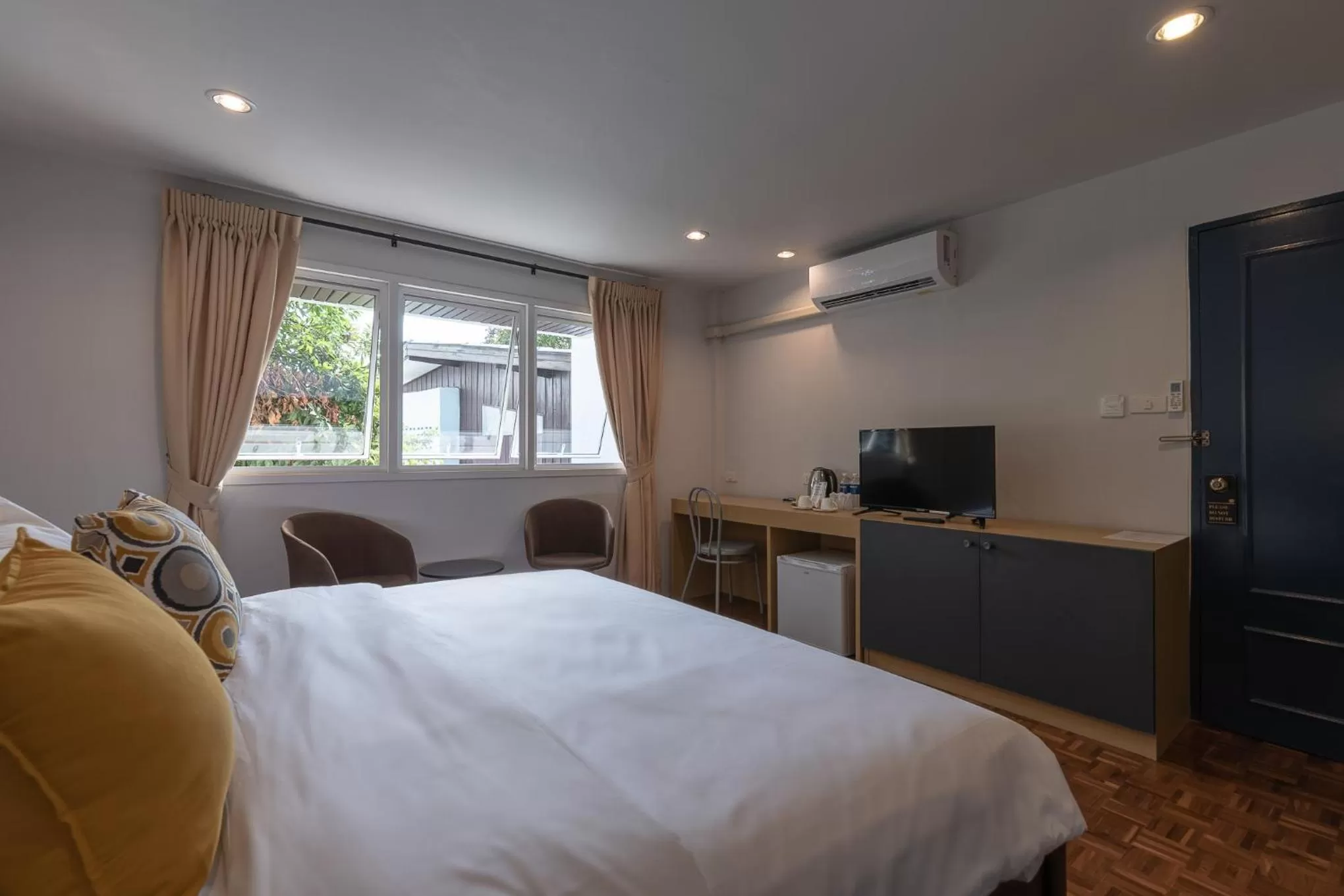 Photo of the whole room, Bed in The Mellow Pillow Hotel @ Chiang Mai Gate