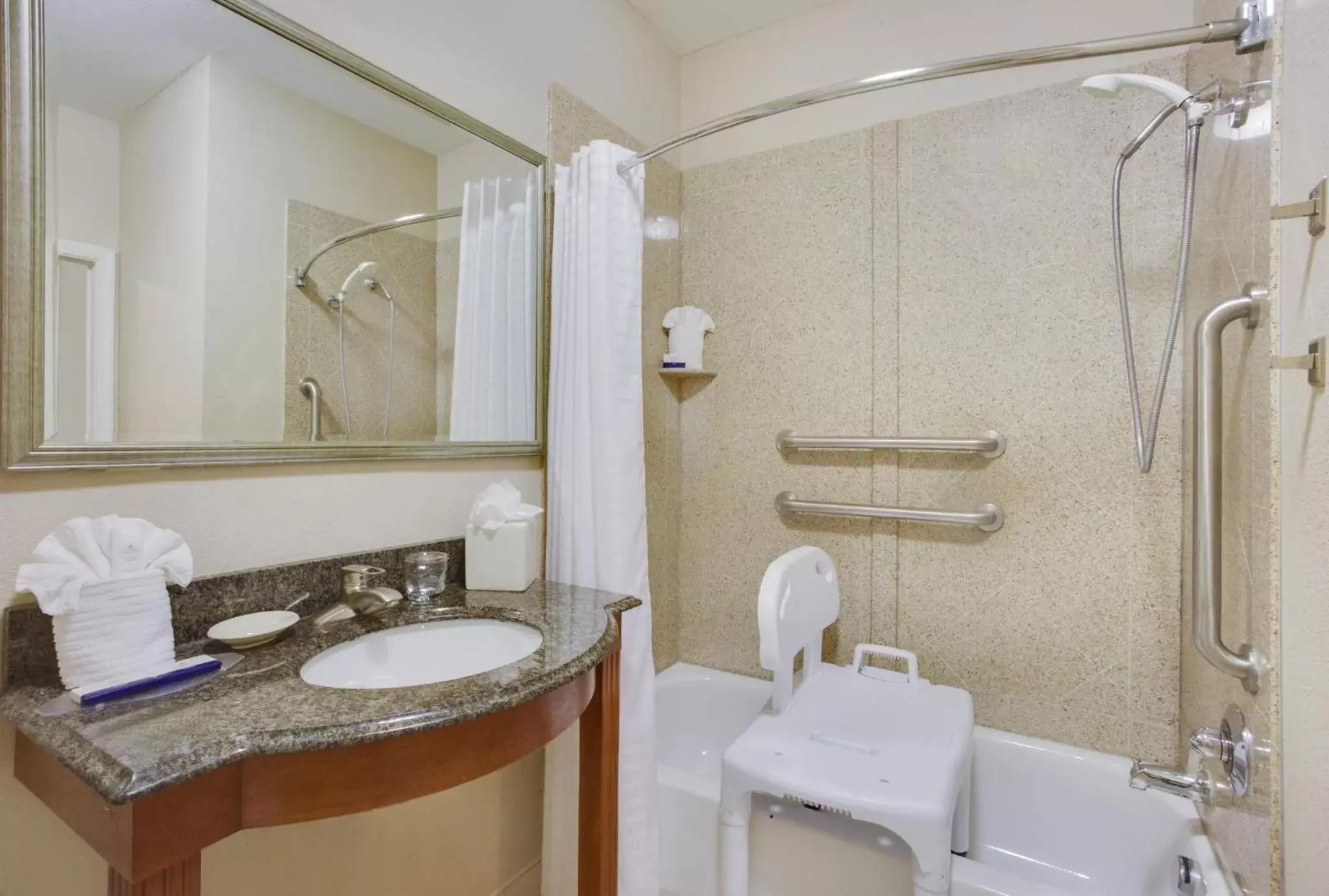 Bathroom in Candlewood Suites Virginia Beach Town Center, an IHG Hotel