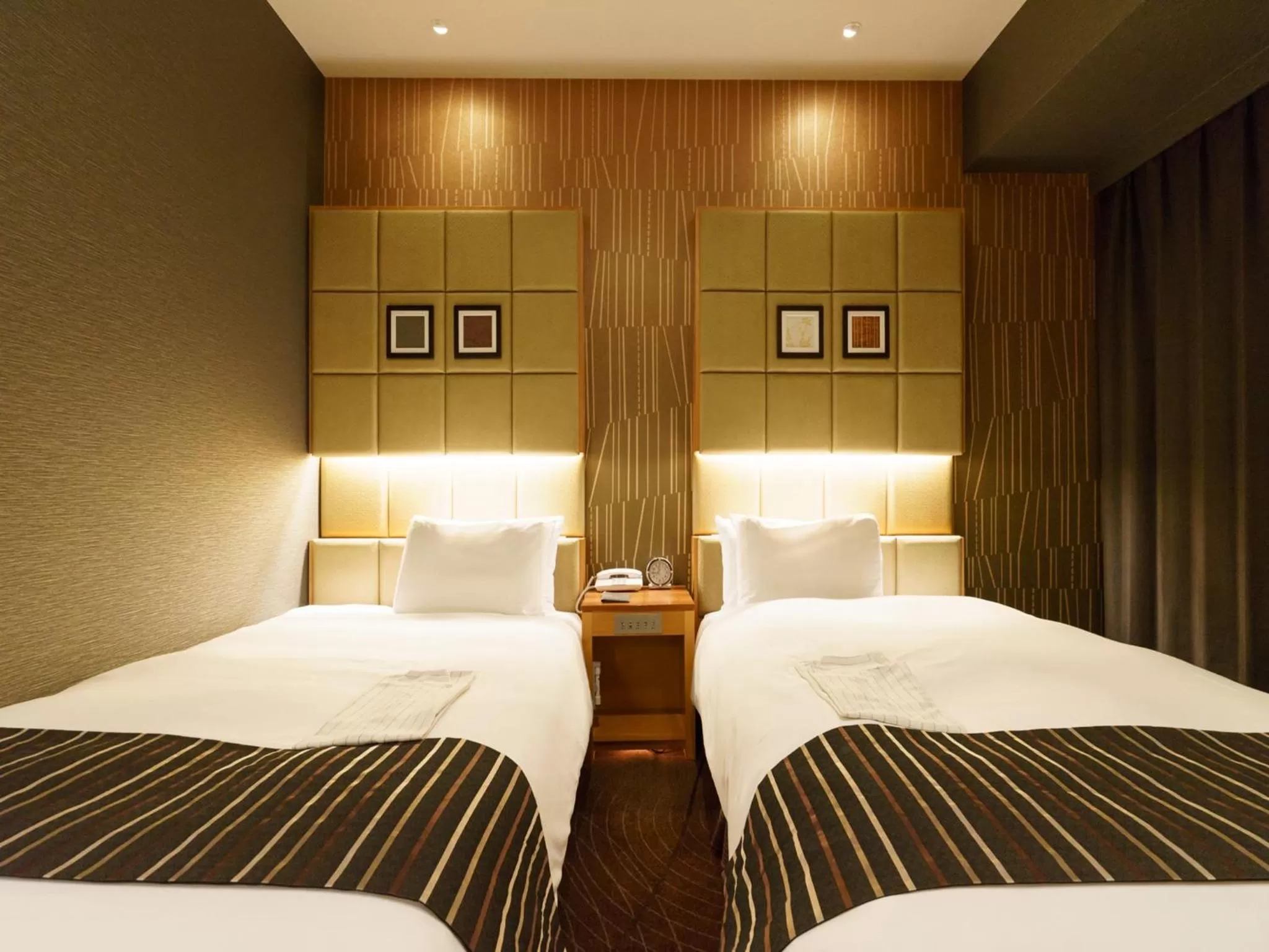 Bed in Sotetsu Fresa Inn Higashi Shinjuku