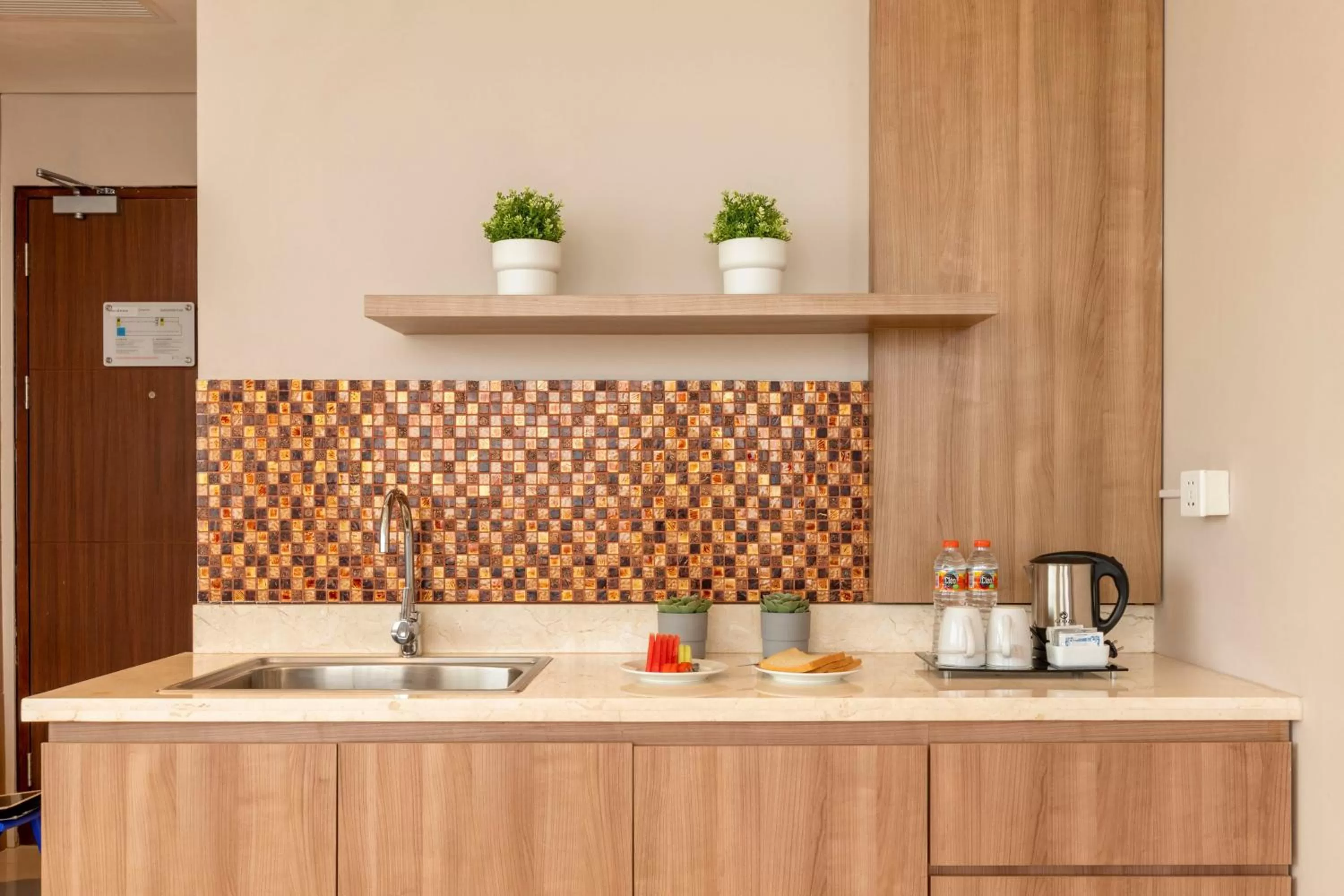 Kitchen or kitchenette in Antero Hotel Jababeka Cikarang