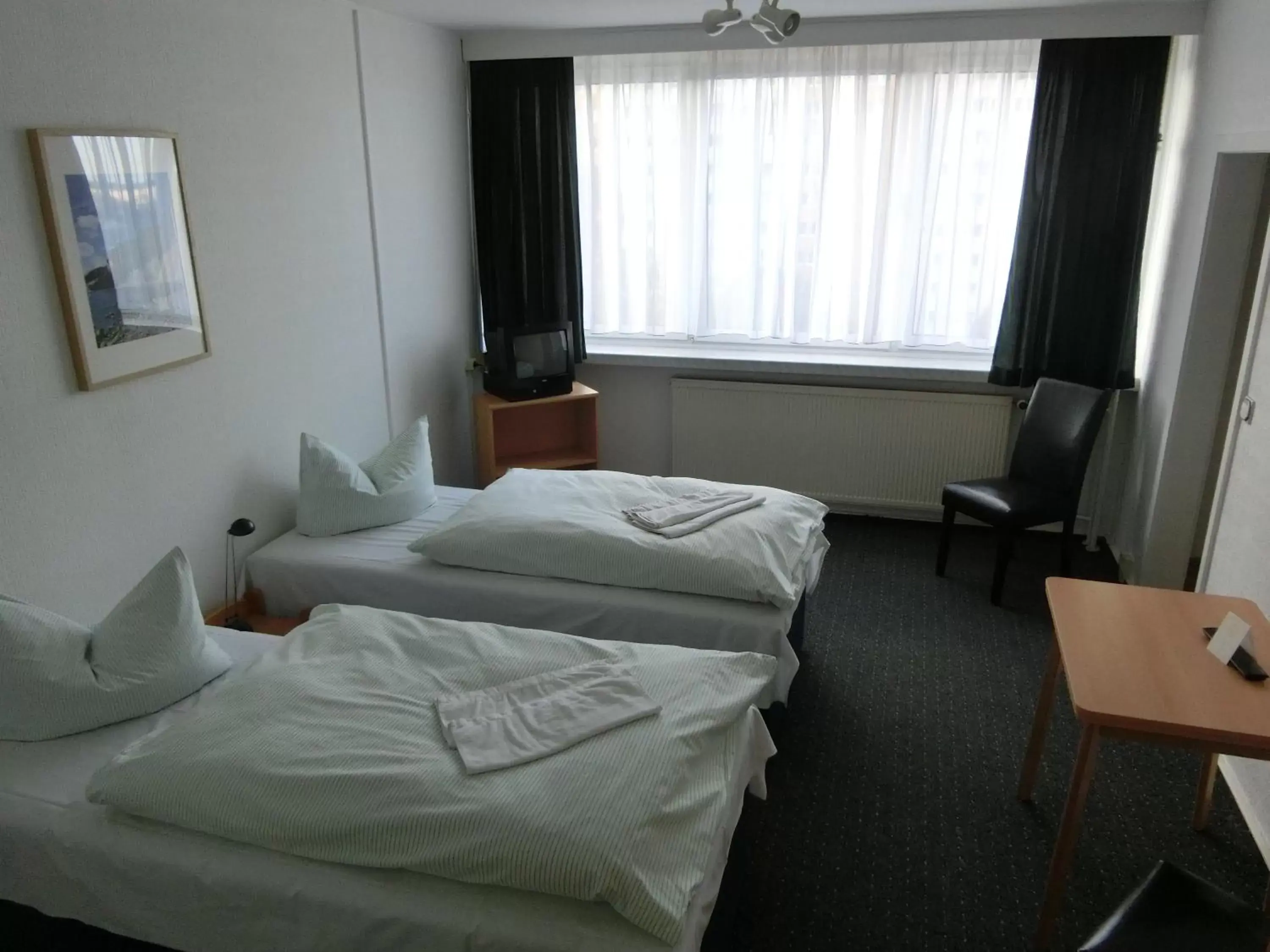 Photo of the whole room, Bed in Gästehaus Rostock Lütten Klein