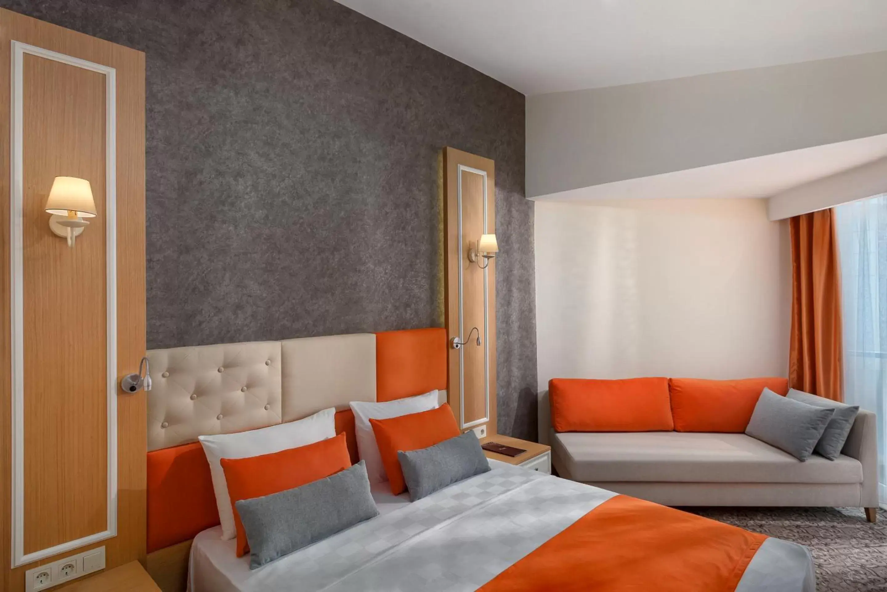 Bed in Golden Orange Hotel