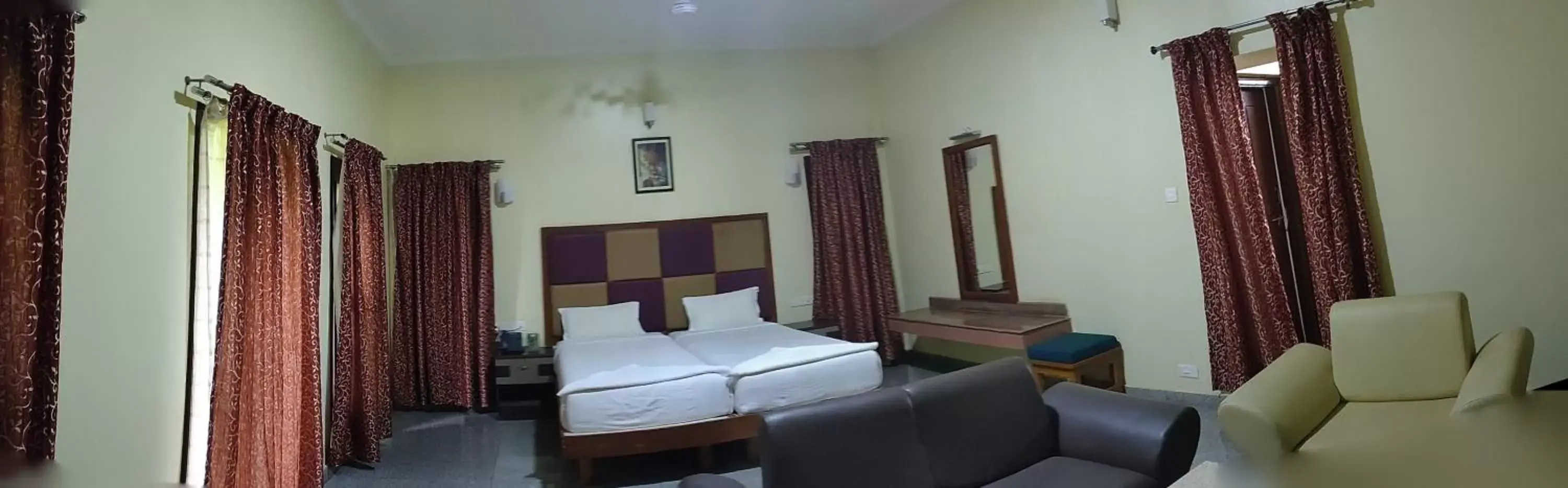 Bedroom, Seating Area in Kanthi Resorts Badami