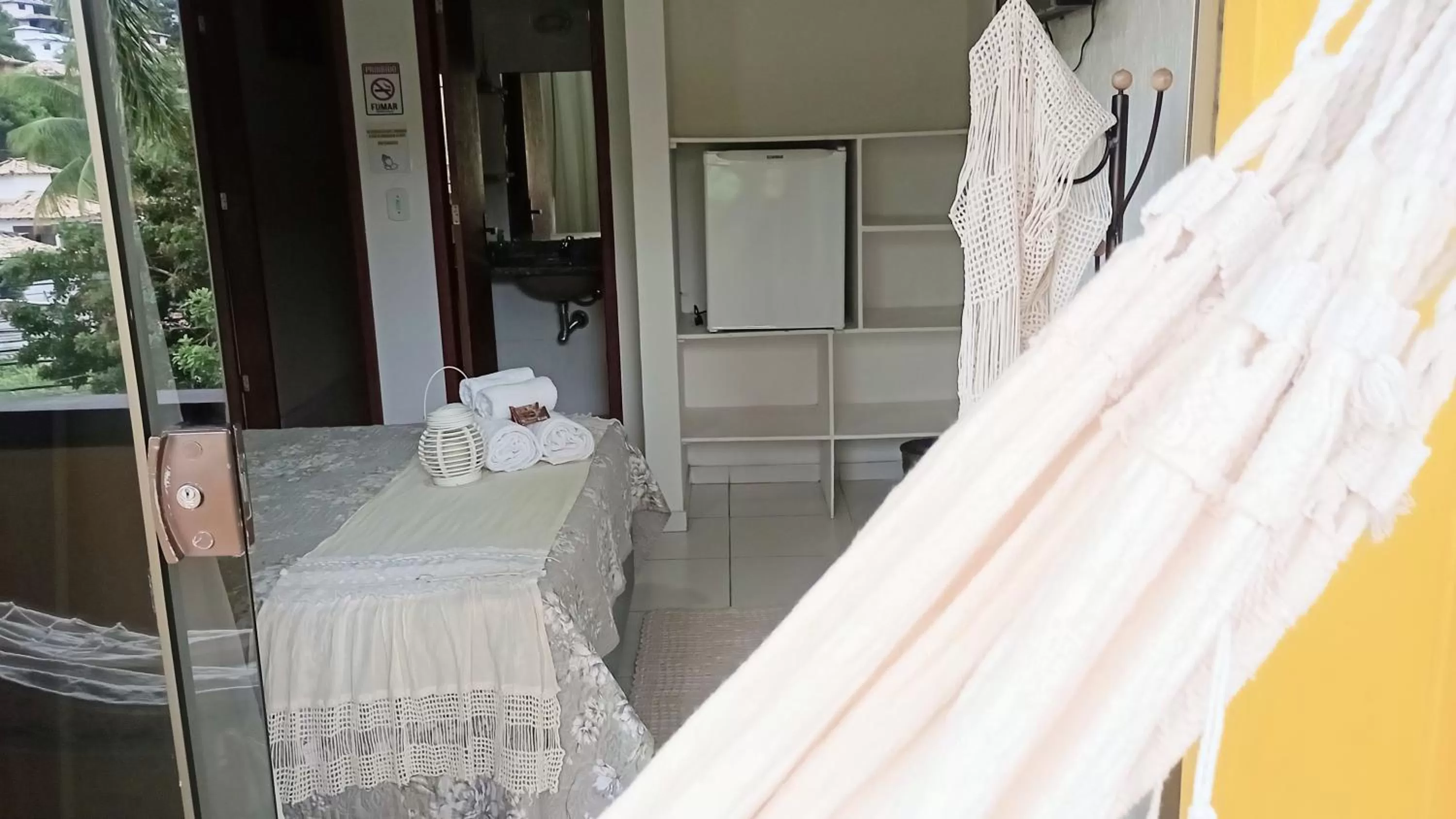 Bed in Hibiscos Pousada